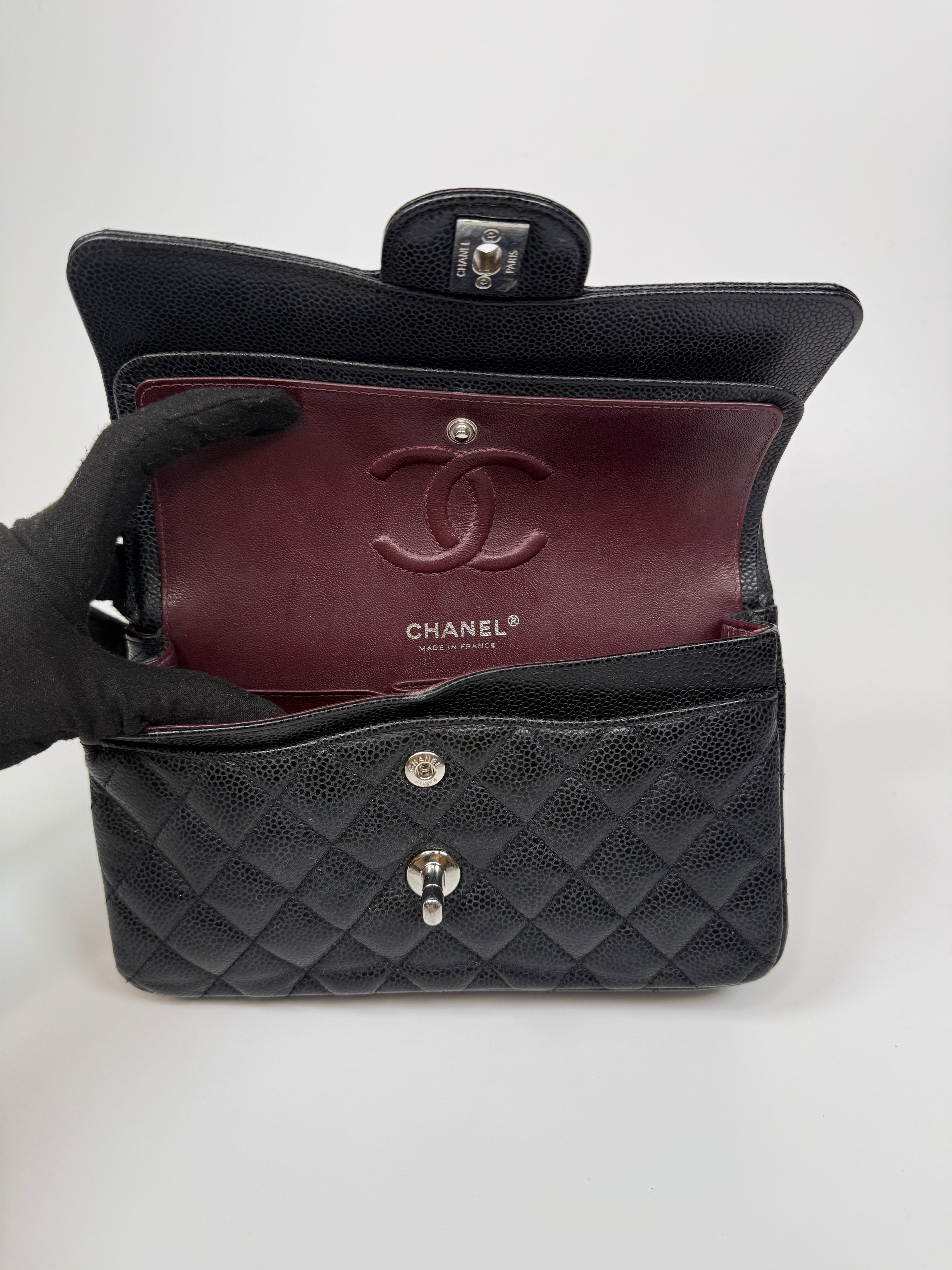 Chanel Small Classic Double Flap In Black Caviar Leather With Silver Hardware. Authentic and preloved in very good condition. 100% Authenticity guarantee 