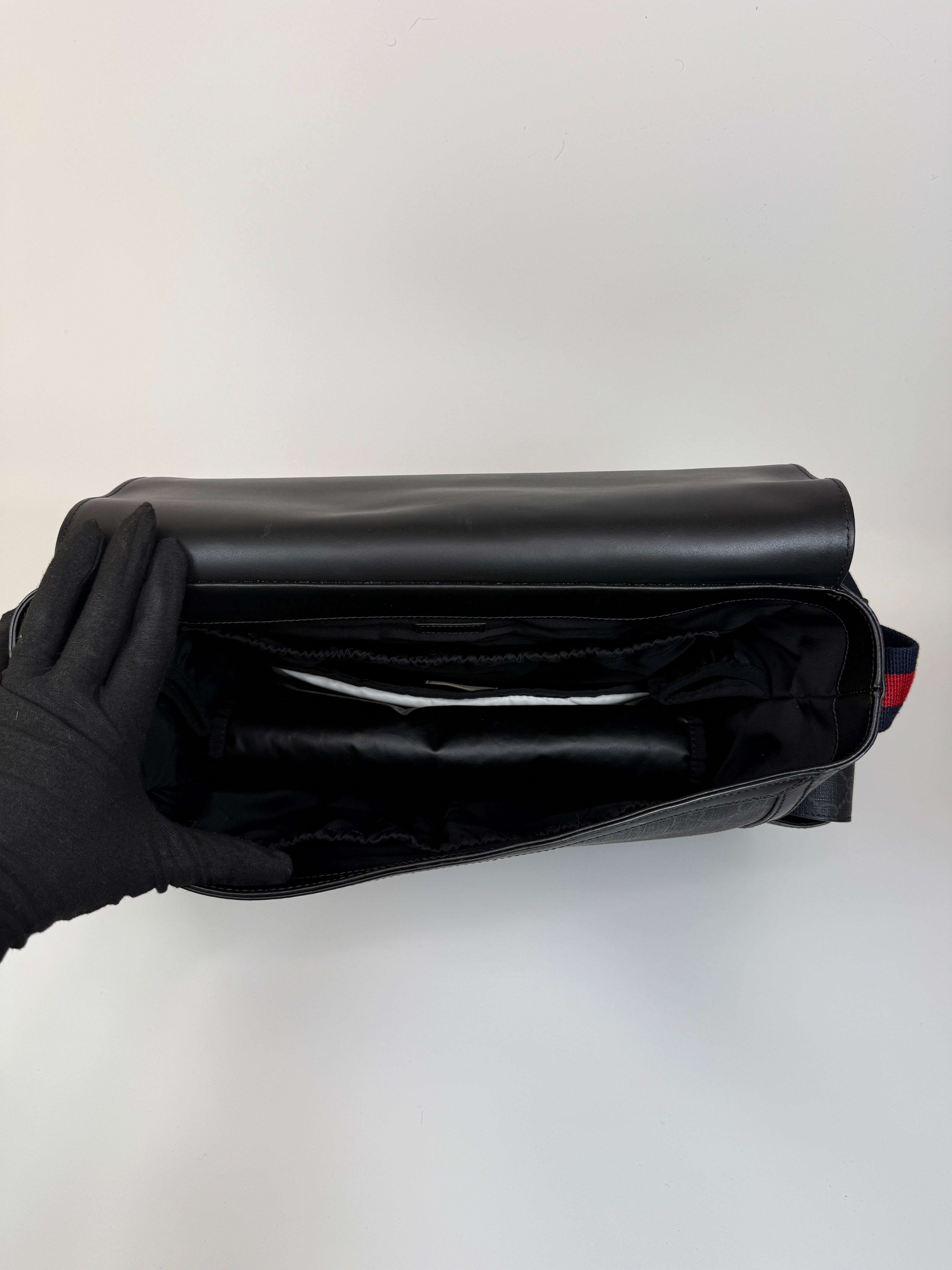 Authentic and preloved Gucci GG Supreme Medium Baby Changing Bag In Black Canvas. Excellent condition. 100% Authenticity guarantee 