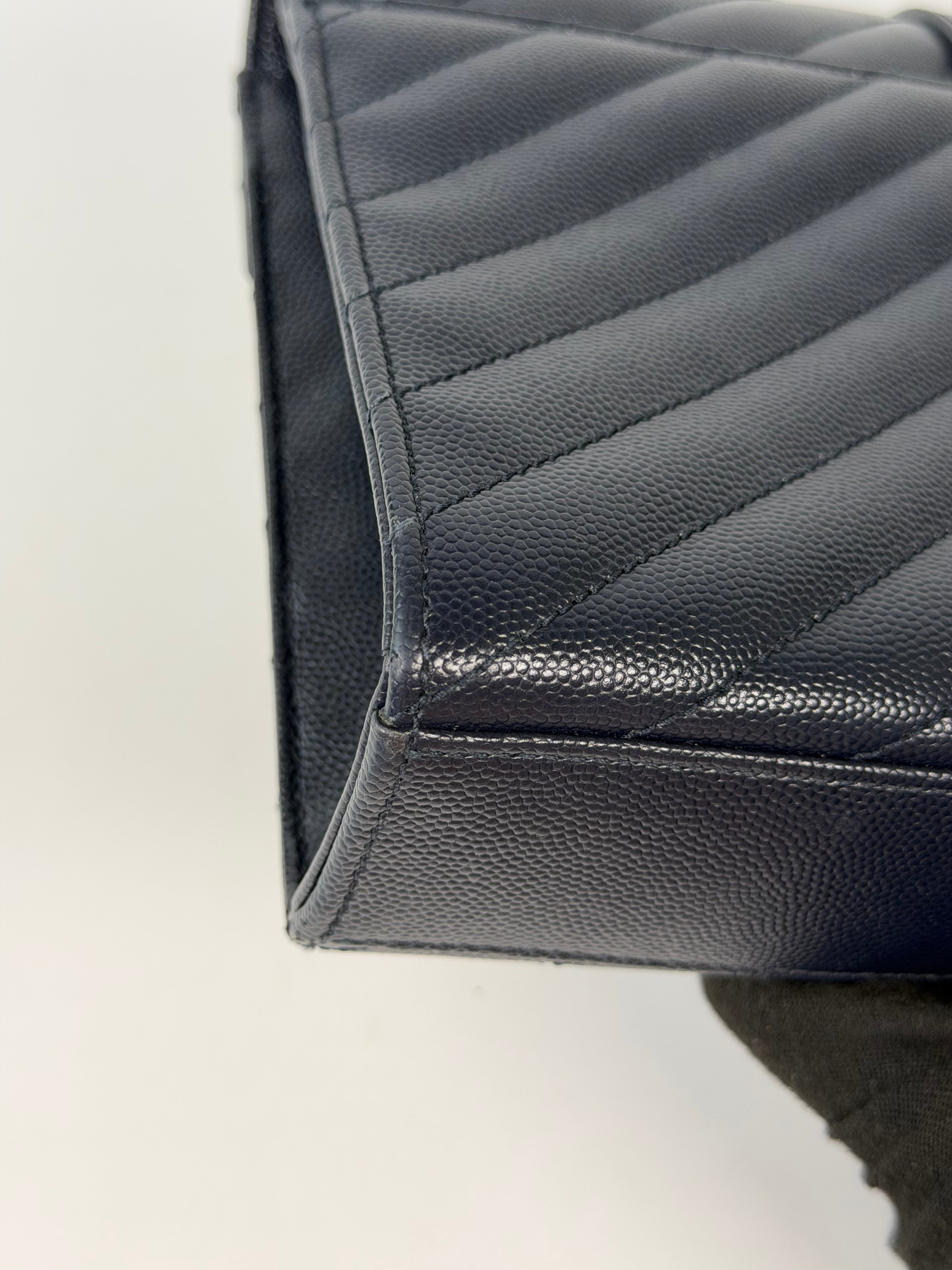 Authentic and pre loved Saint Laurent Medium Envelope Bag In Blue Grained Leather With Gold Hardware. Excellent Condition. Verified by Luxe Cheshire 