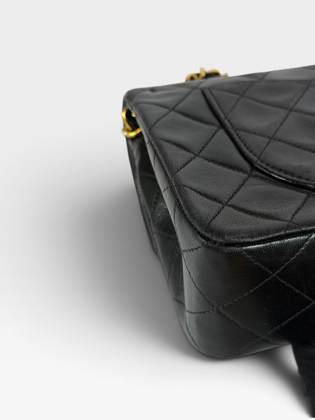 Chanel Vintage Small Classic Double Flap In Black Lambskin Leather 24Kt Hardware. Authentic and preloved in excellent condition. 100% guarantee