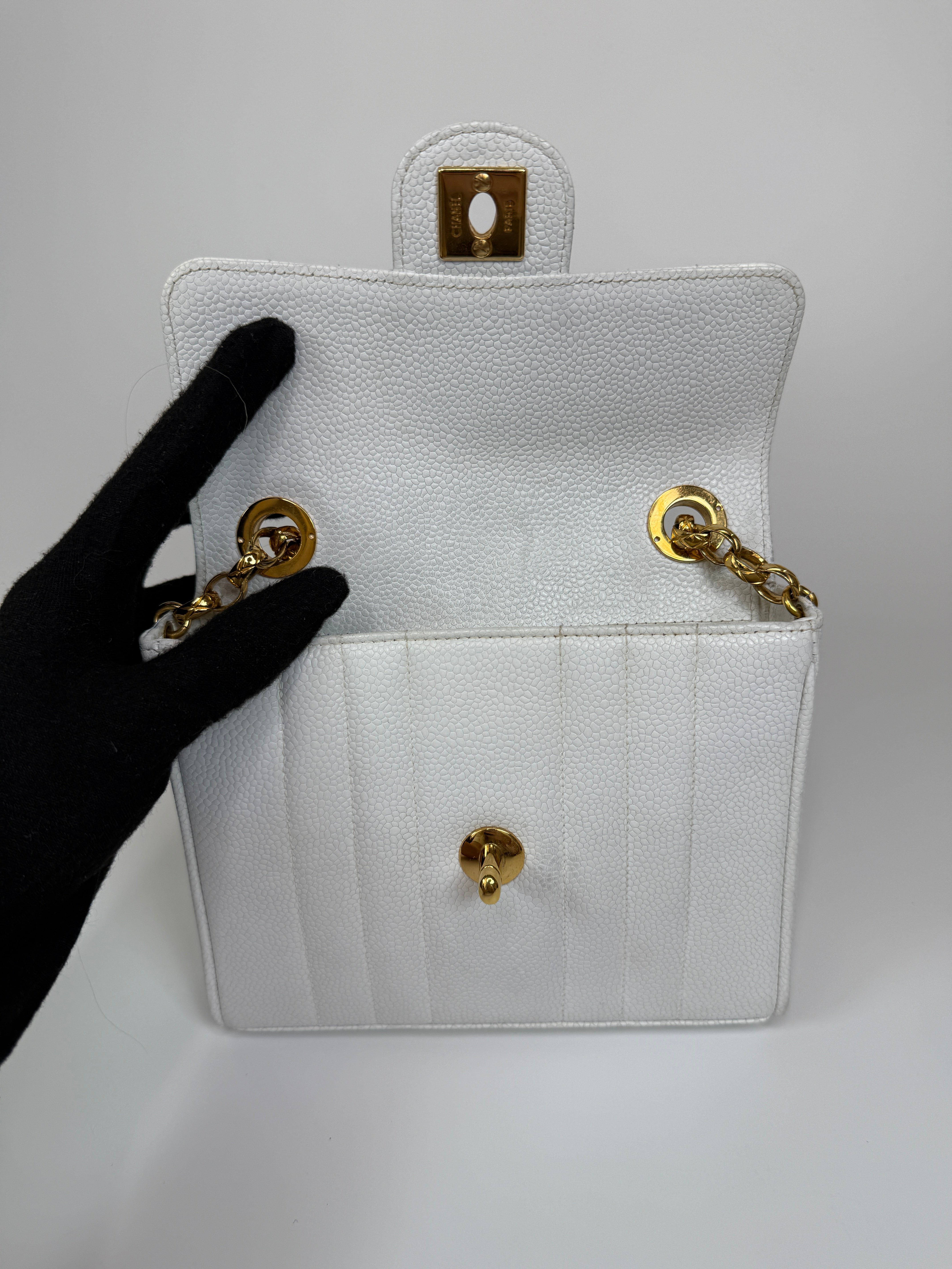 Chanel Vintage Mini Square Flap In White Caviar Leather With 24kt Gold Hardware. Excellent condition 100% Authenticity Guarantee 