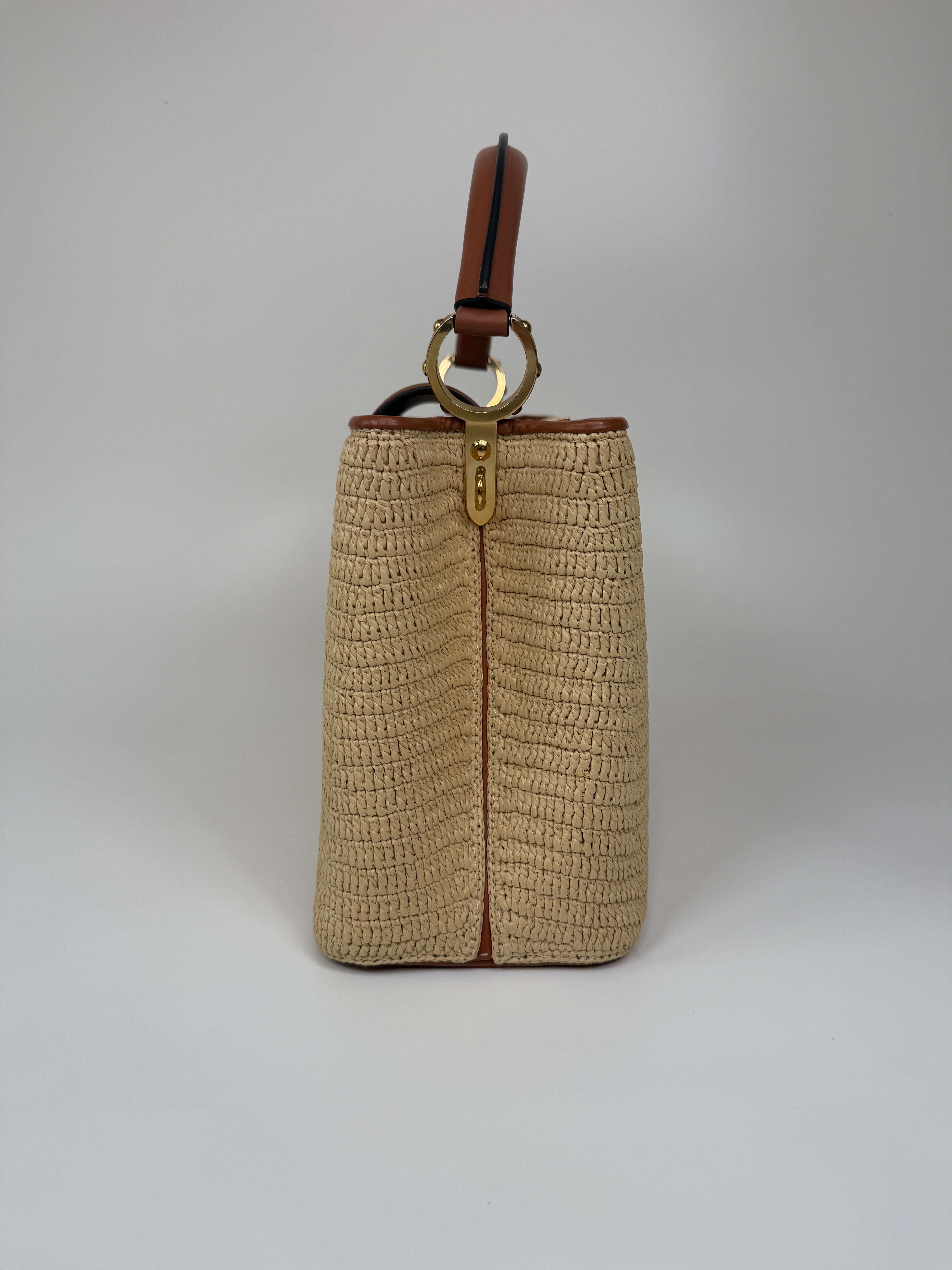 Louis Vuitton Capucines MM Bag In Raffia. Excellent Preloved condition. 100% Authenticity guarantee. 