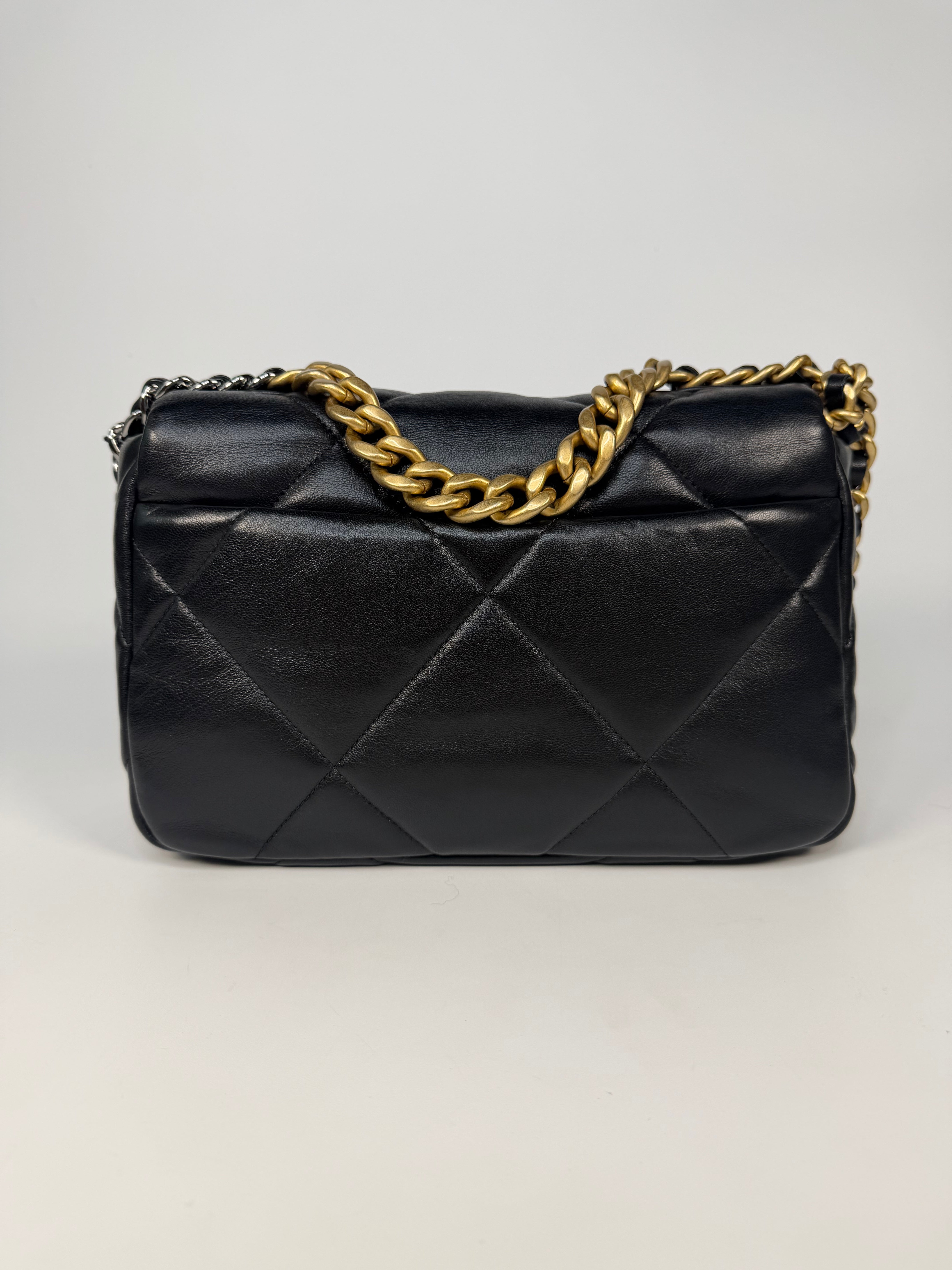 Chanel 19 Small In Black & White Leather With Mixed Hardware. Authentic and preloved in very good condition. Verified by Luxe Cheshire.