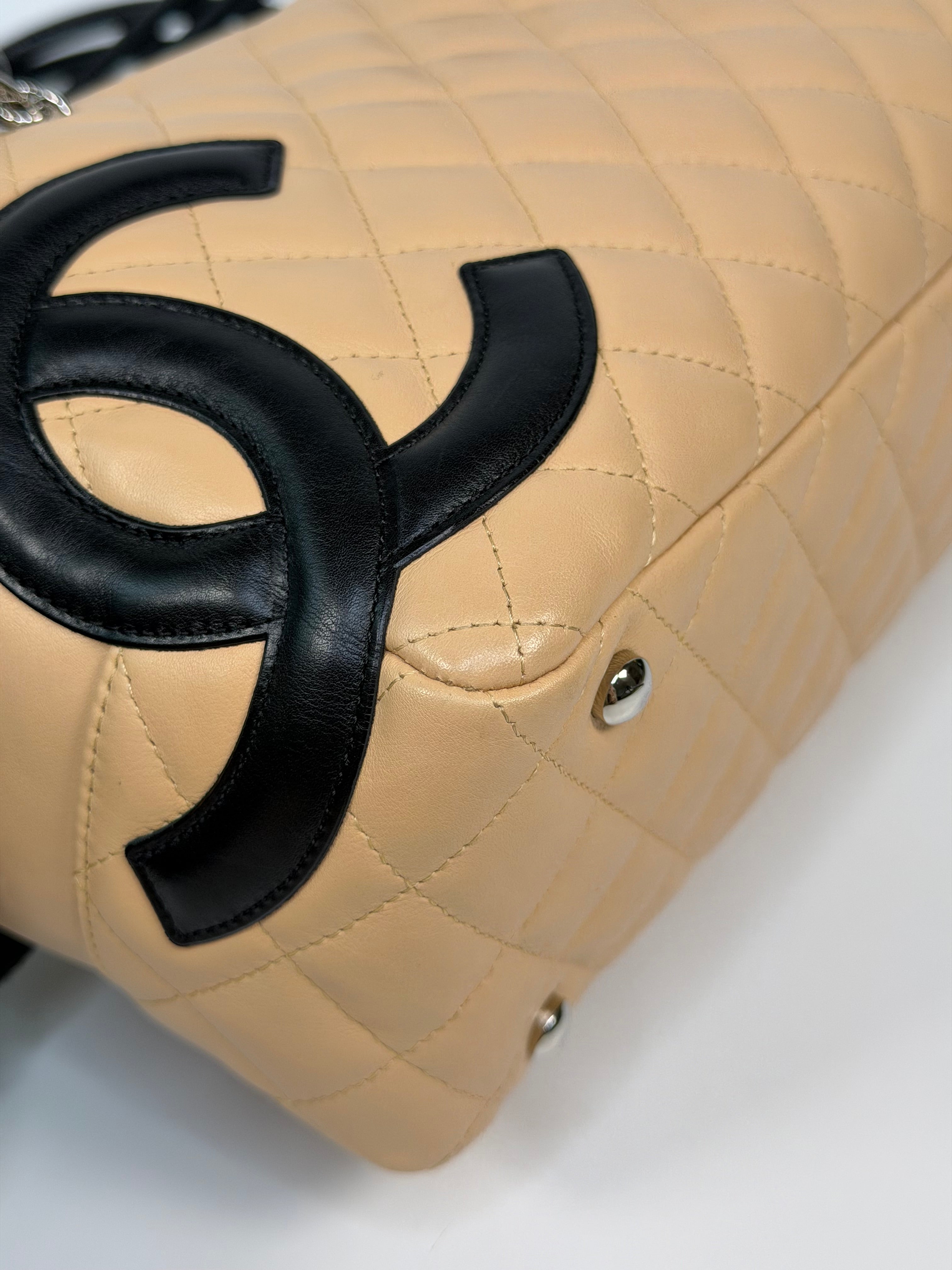 Chanel Cambon Bowling Bag In Beige / Black Leather With Silver Hardware. Authentic and preloved in excellent condition.