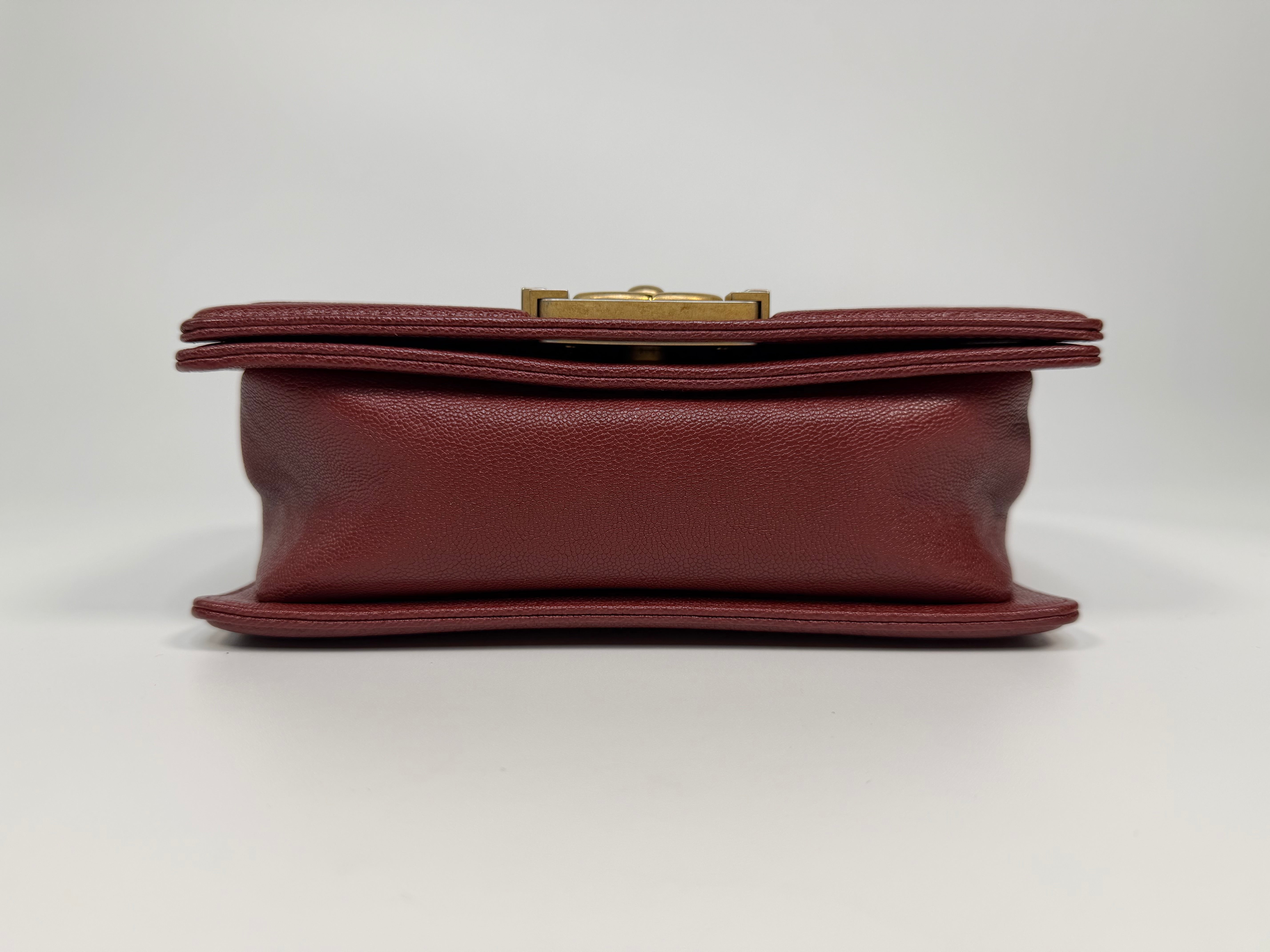 Chanel Le Boy Bag In Burgundy Caviar Leather Gold Hardware. Authentic and preloved in excellent condition.