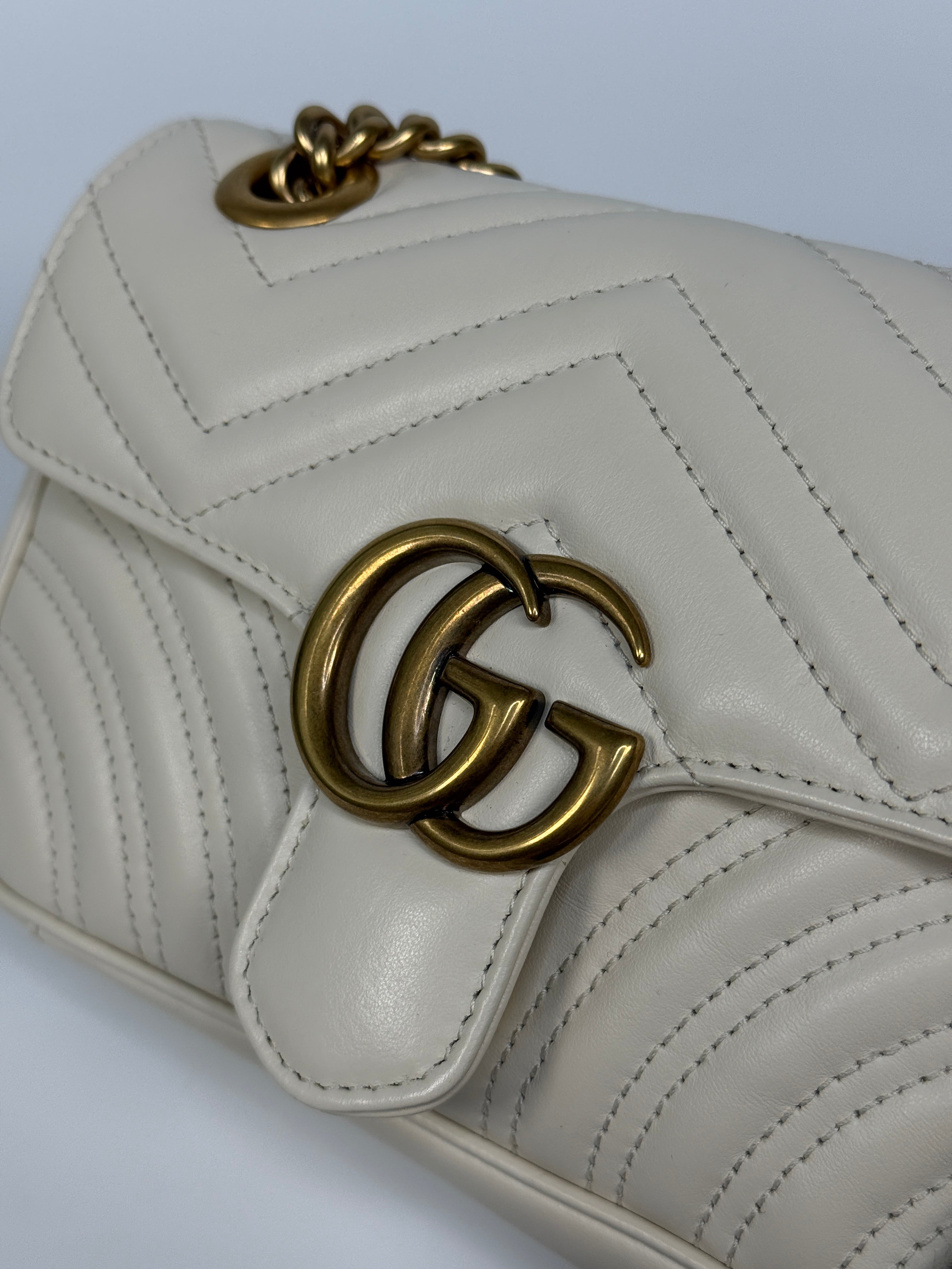 Gucci GG Small Marmont Matelasse Shoulder Bag In Ivory Leather With Gold Hardware 