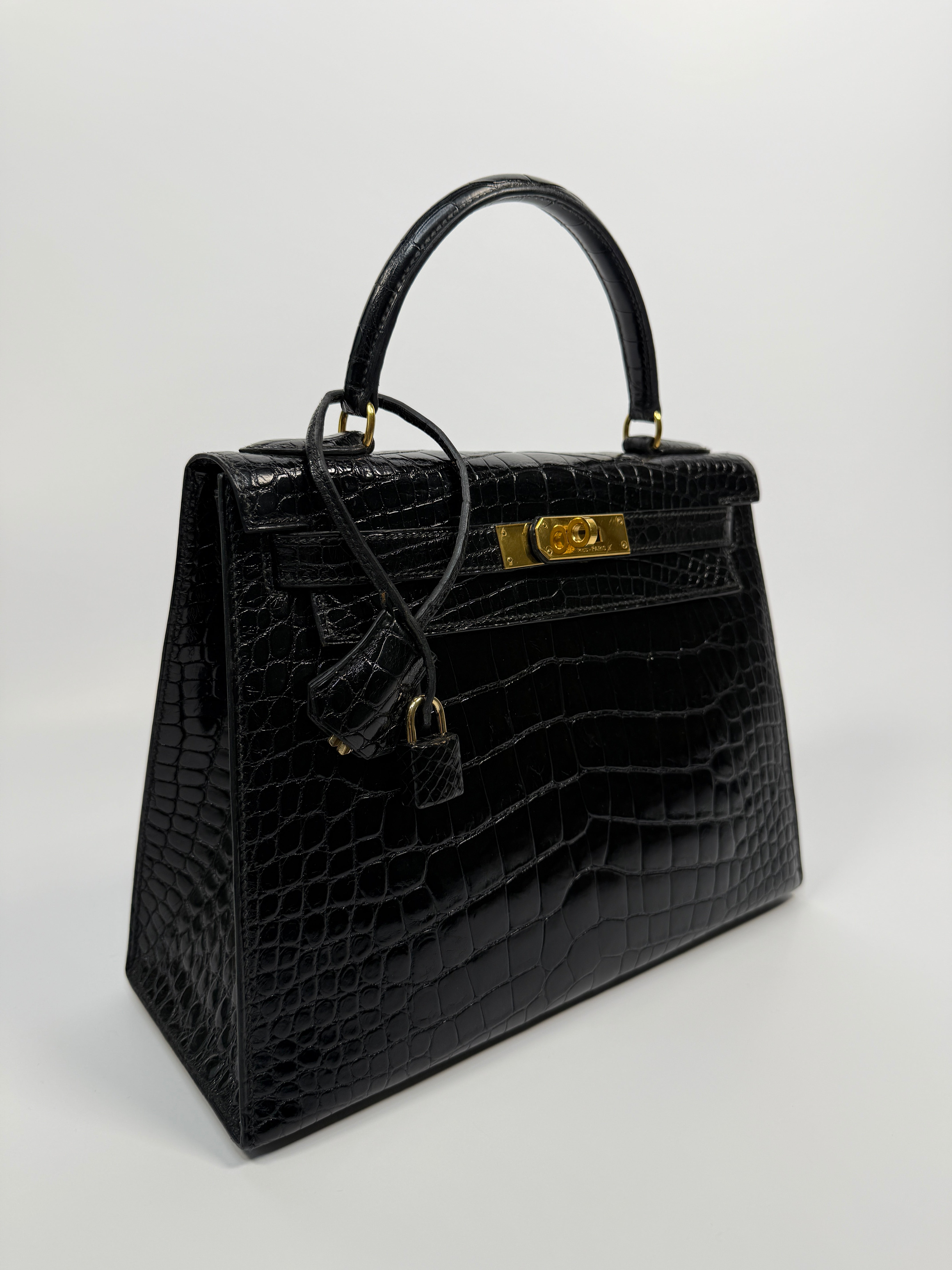 Hermès Vintage Kelly 28 In Shiny Black Crocodile With Gold Hardware Authentic