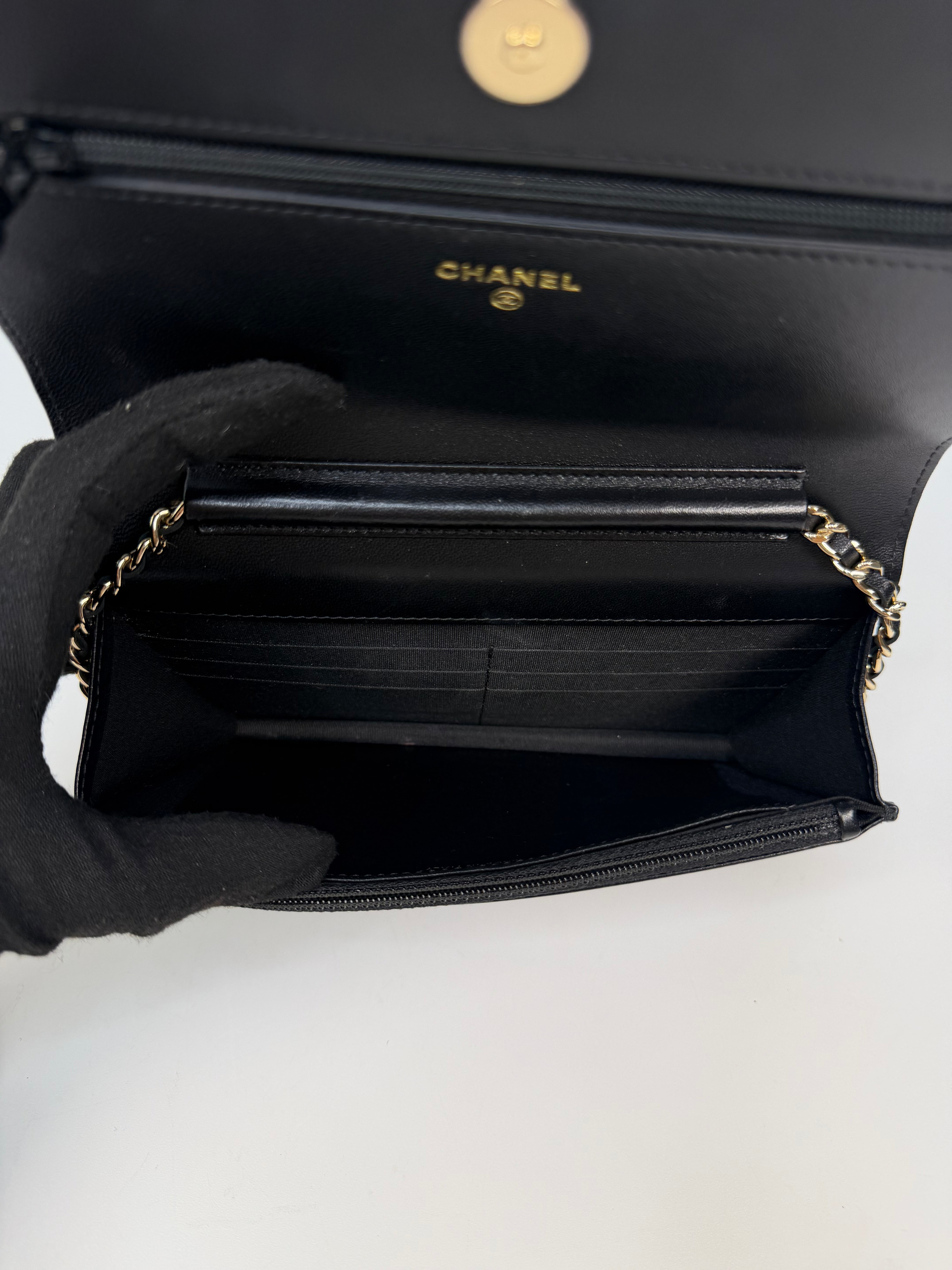 Chanel  Wallet On Chain Black lambskin Leather Gold hardware
Very Good condition, Authentic, Pre Loved. Verified by Luxe Cheshire. International, fast and fully insured delivery. Trusted designer resale.