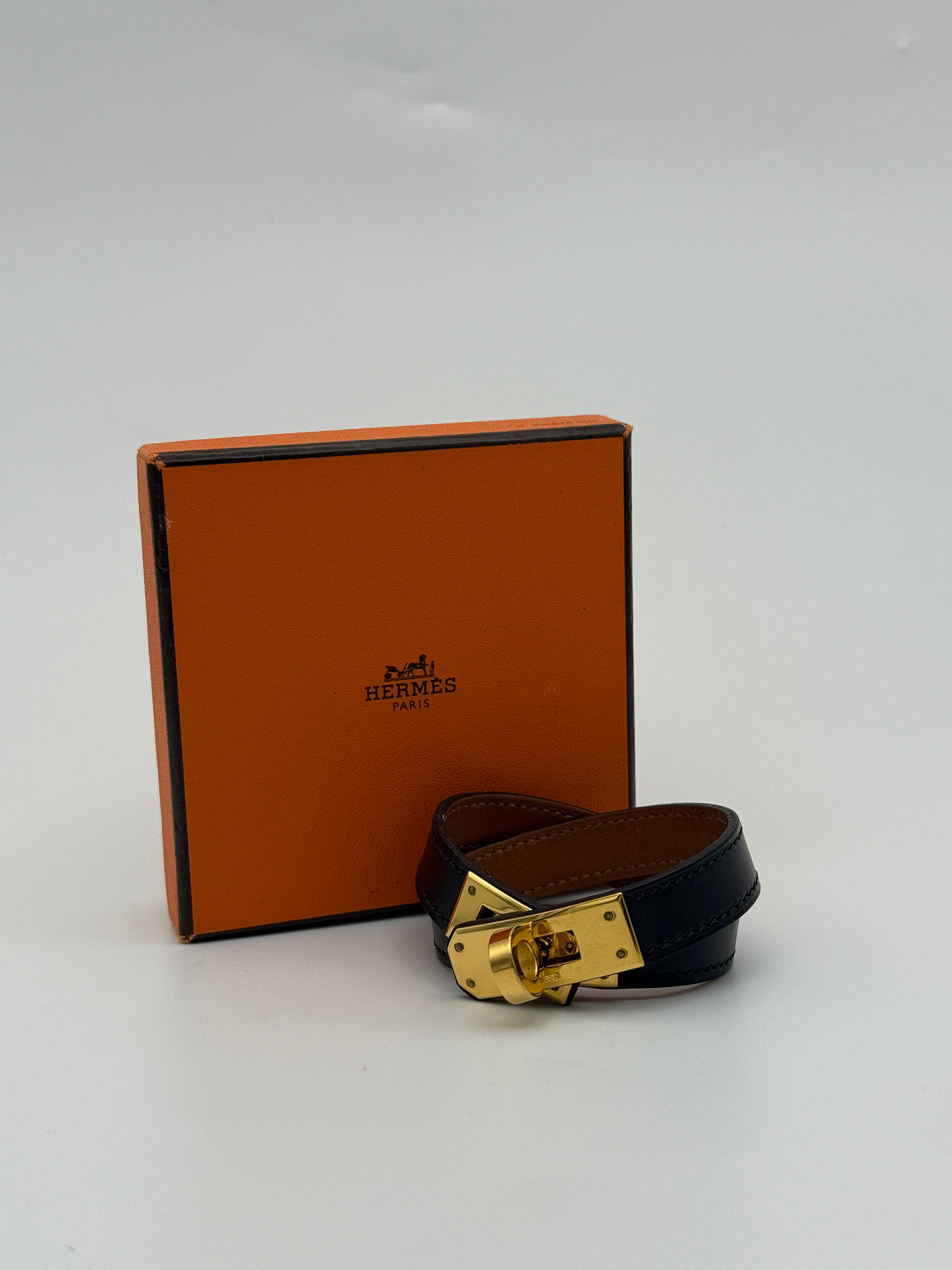 Hermès Kelly Double Tour Bracelet in black leather with gold hardware 