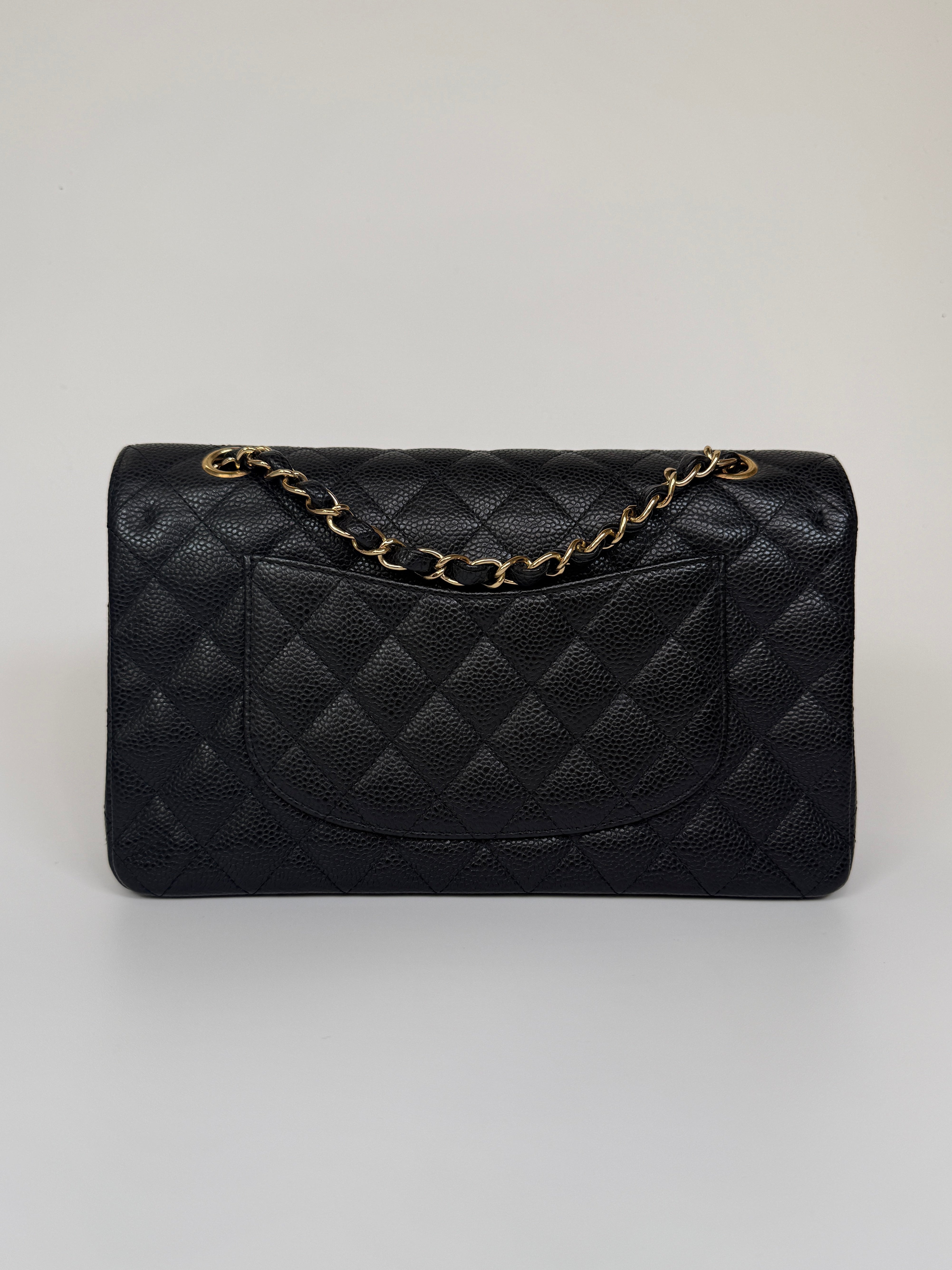 Chanel Medium Classic Double Flap Black Caviar Leather With Gold Hardware. Authentic and preloved. 100% Authenticity guarantee Chanel 