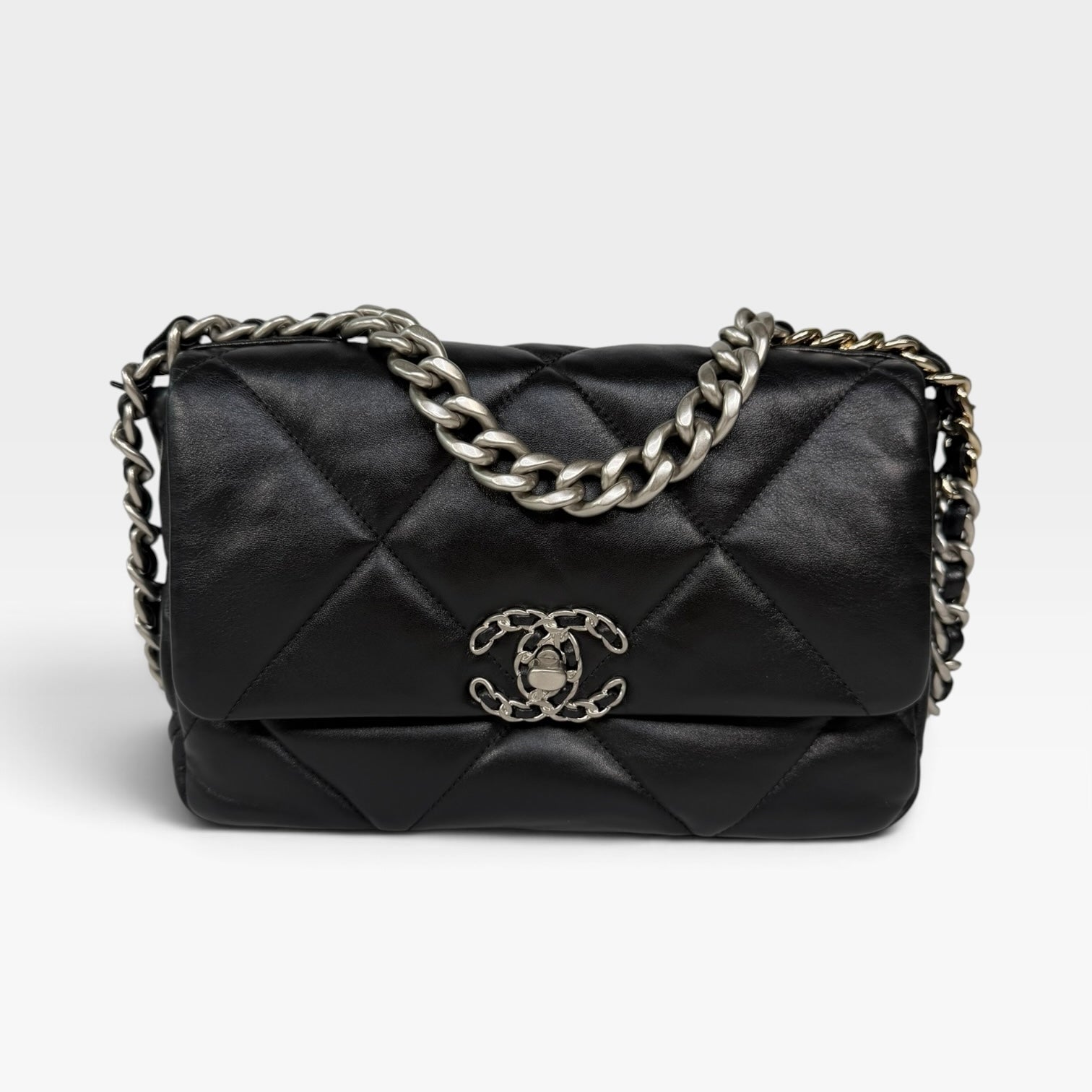 Chanel 19 Small In Black & White Leather With Mixed Hardware. Authentic and preloved in excellent condition. Verified by Luxe Cheshire.