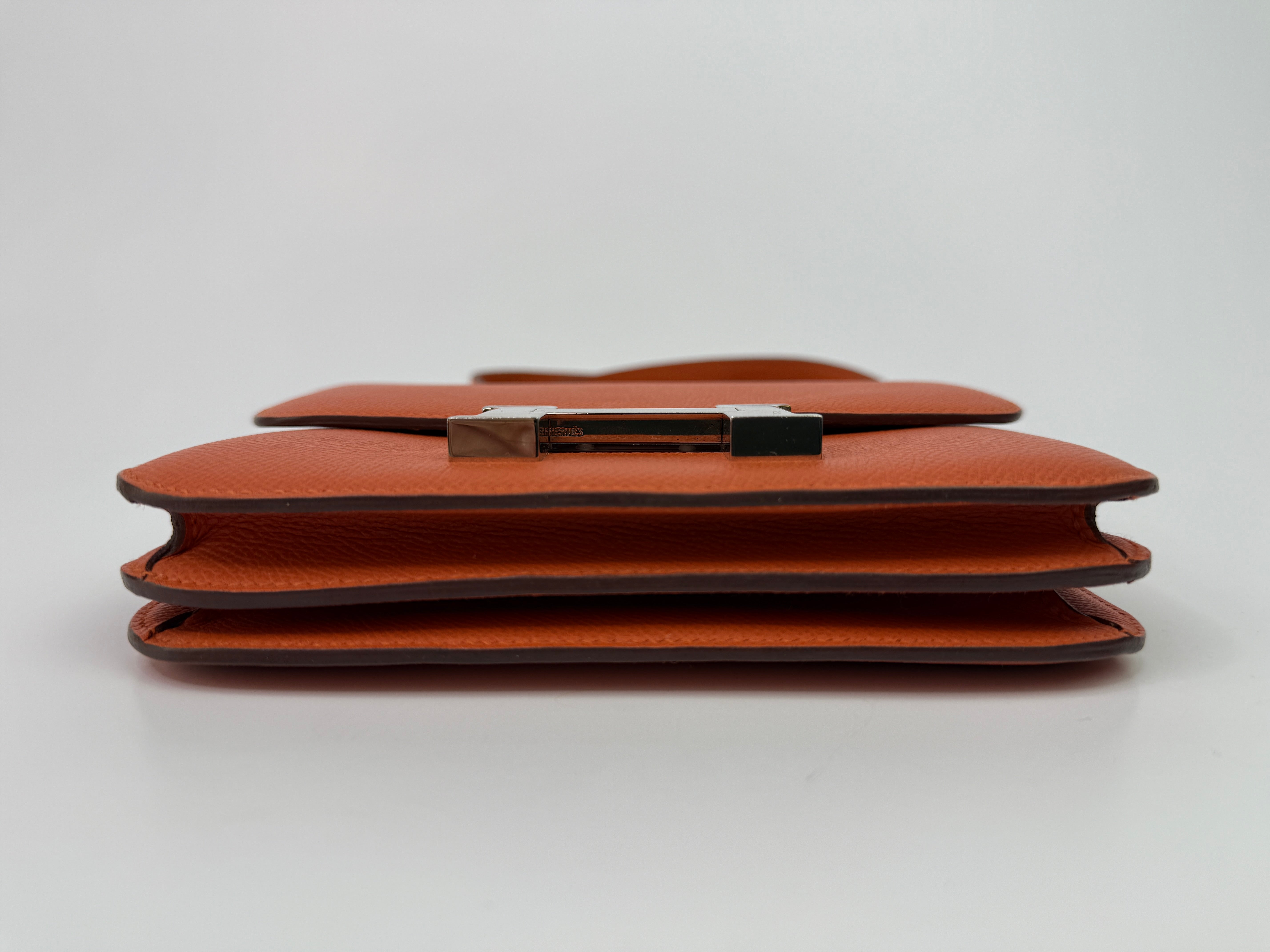 Authentic Pre Loved Hermès Constance 18 In Orange Epsom Leather With Palladium Hardware Very Good Condition