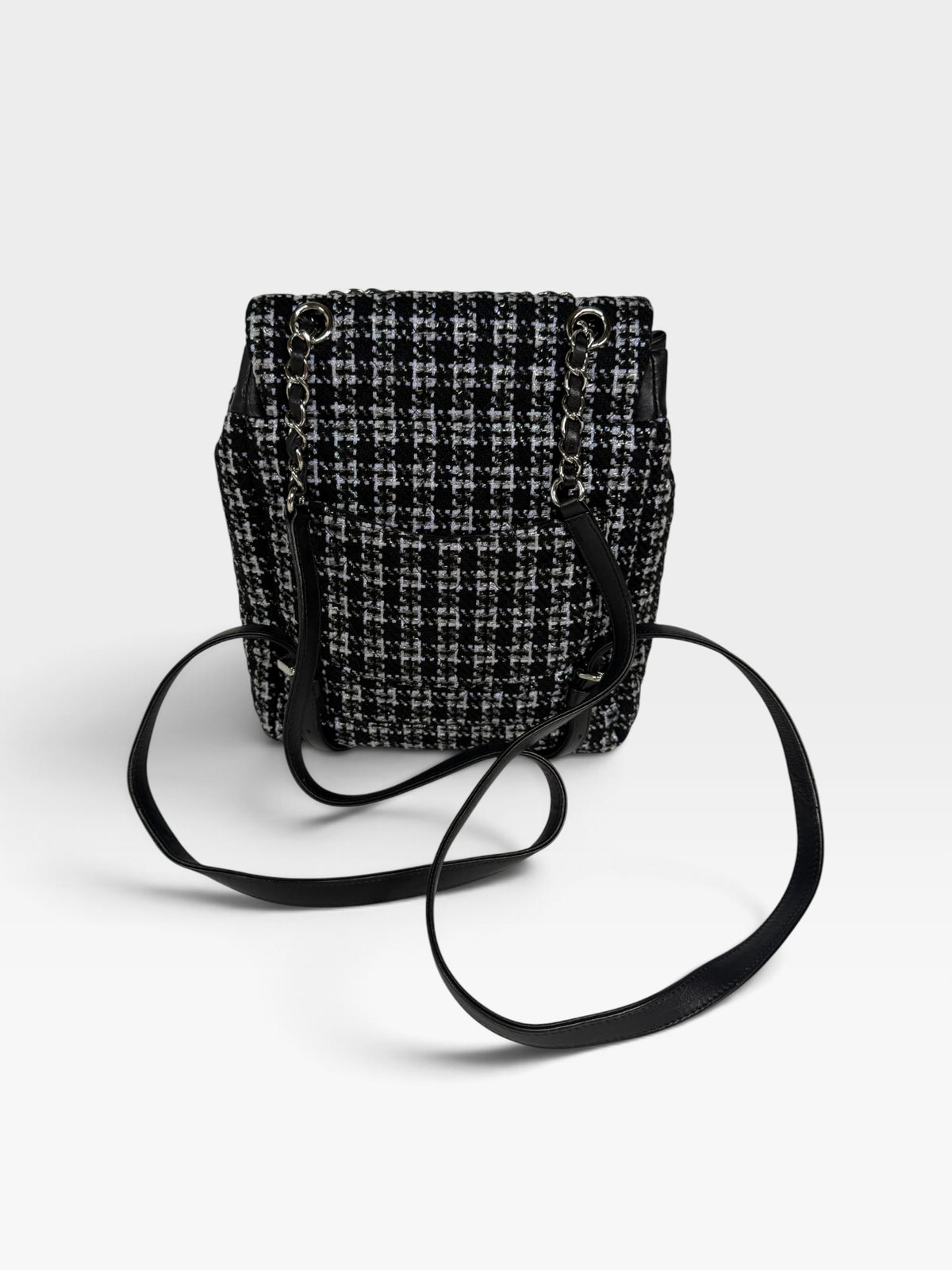 Chanel Backpack In Black & Grey Tweed With Silver Hardware. Authentic and preloved in excellent condition. 100% Guarantee