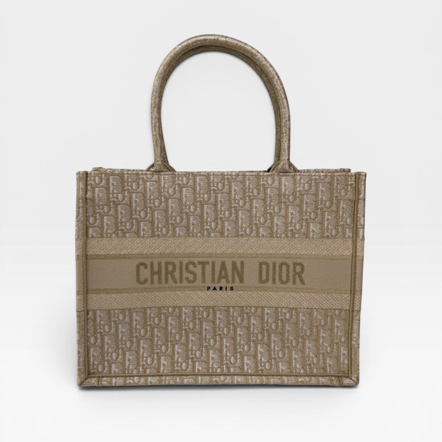 Christian Dior Medium Book Tote In Latte & Gold Tone Dioresque. Authentic and preloved in new and unused condition. 100% trusted guarantee