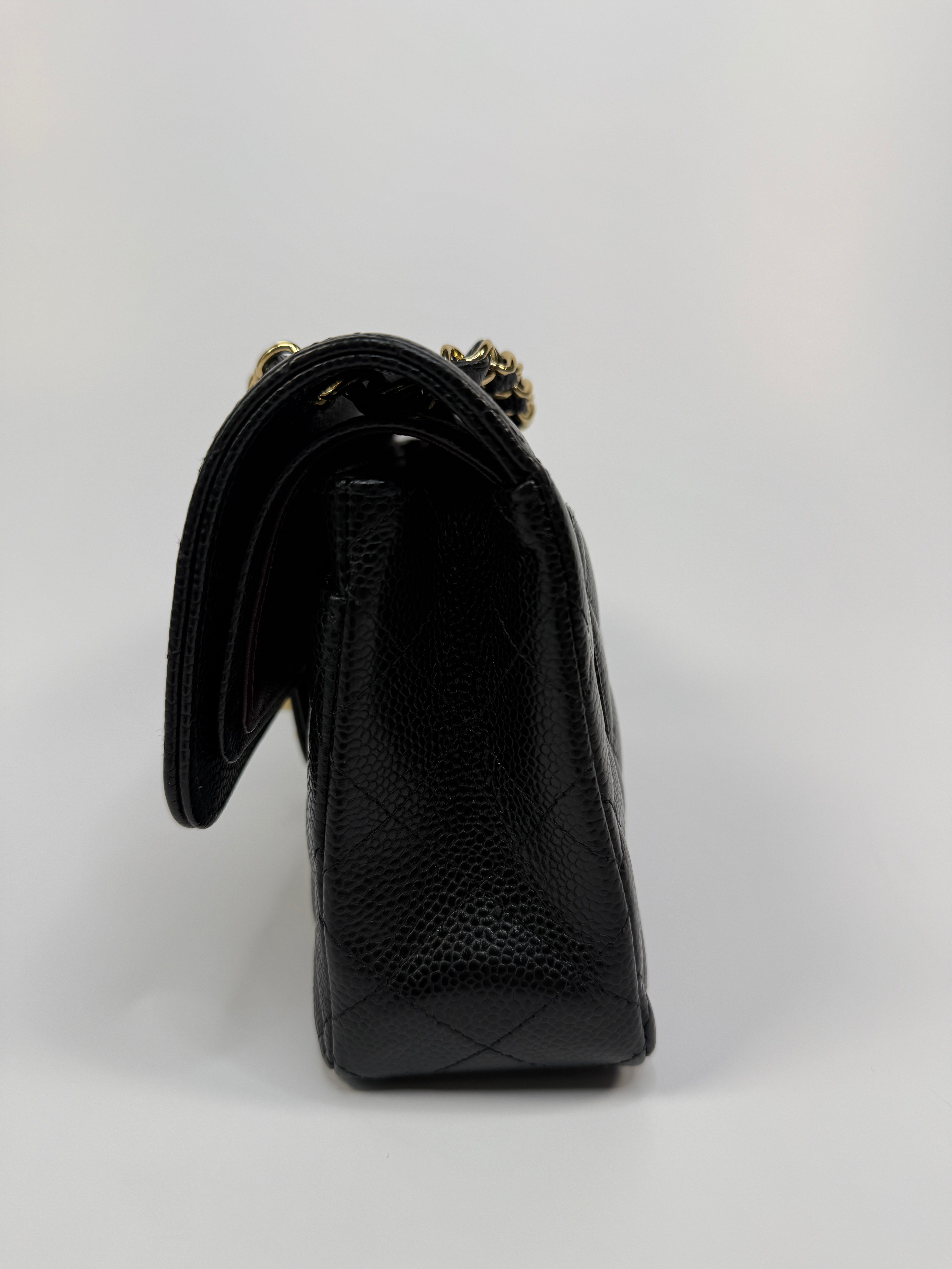 Chanel Small Classic Double Flap In Black Caviar Leather With Gold Hardware
Pre Loved & Authentic 