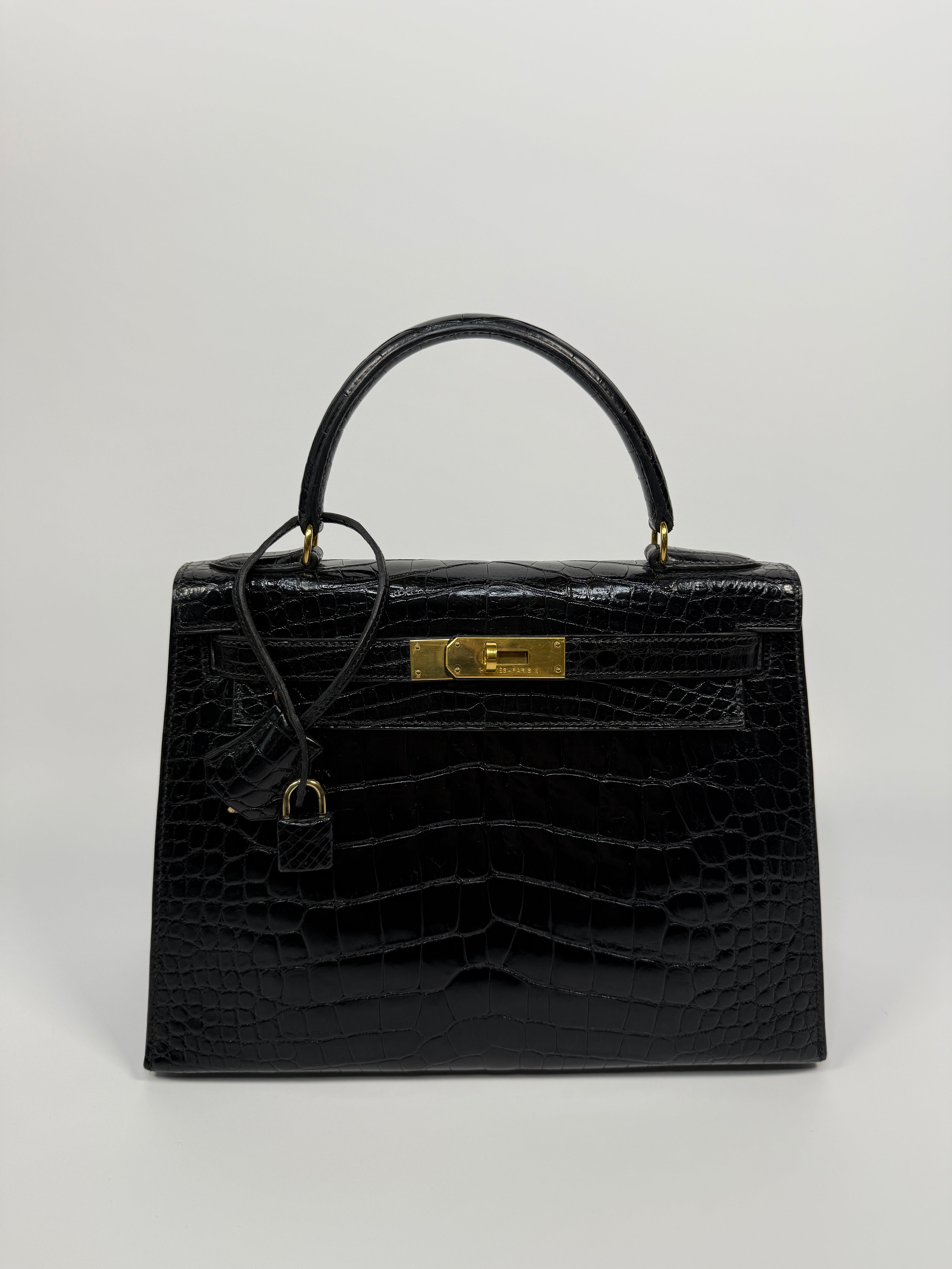 Hermès Vintage Kelly 28 In Shiny Black Crocodile With Gold Hardware Authentic