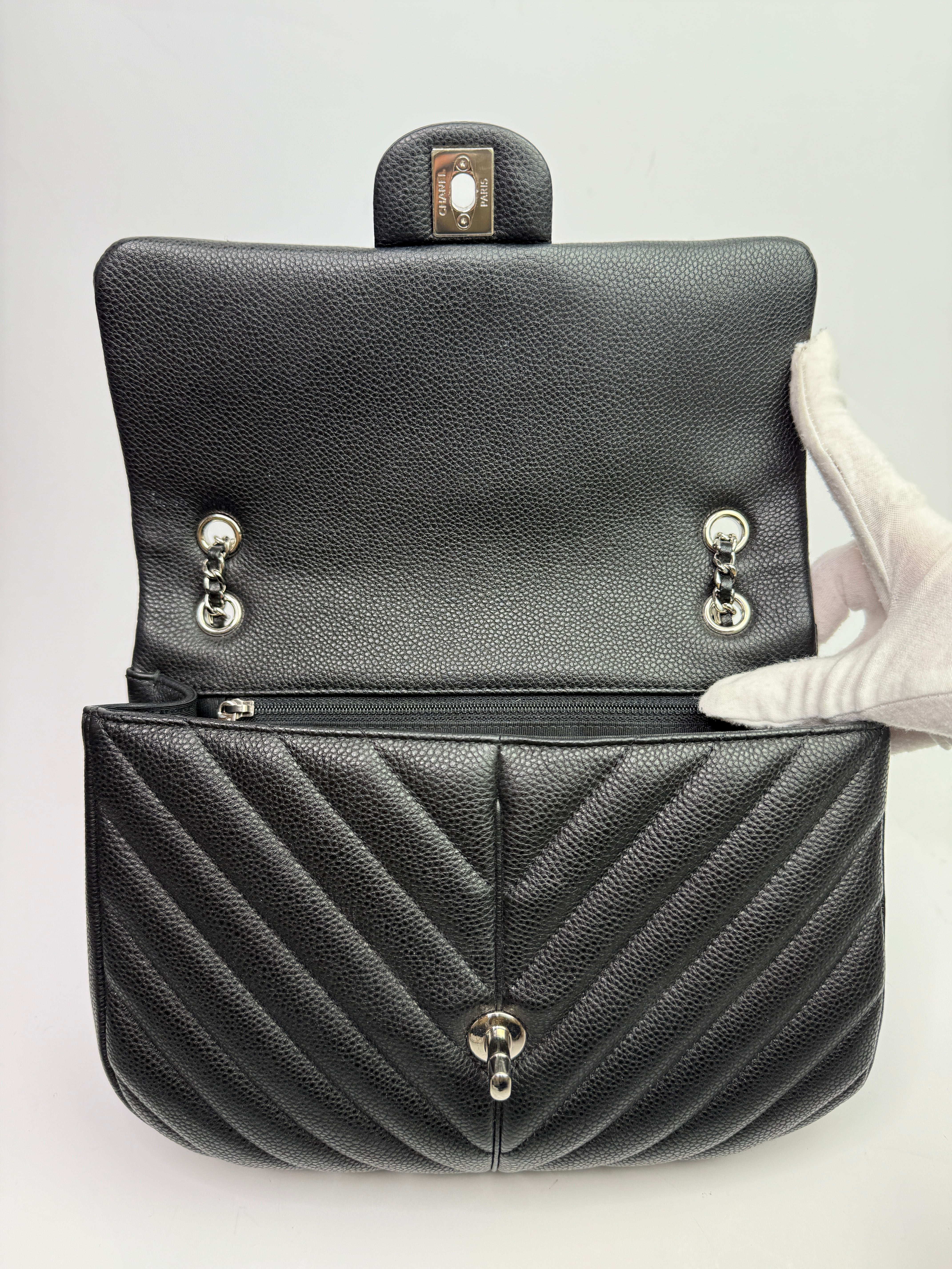 Chanel Seasonal Flap Bag In Black Chevron Caviar Leather With SHW