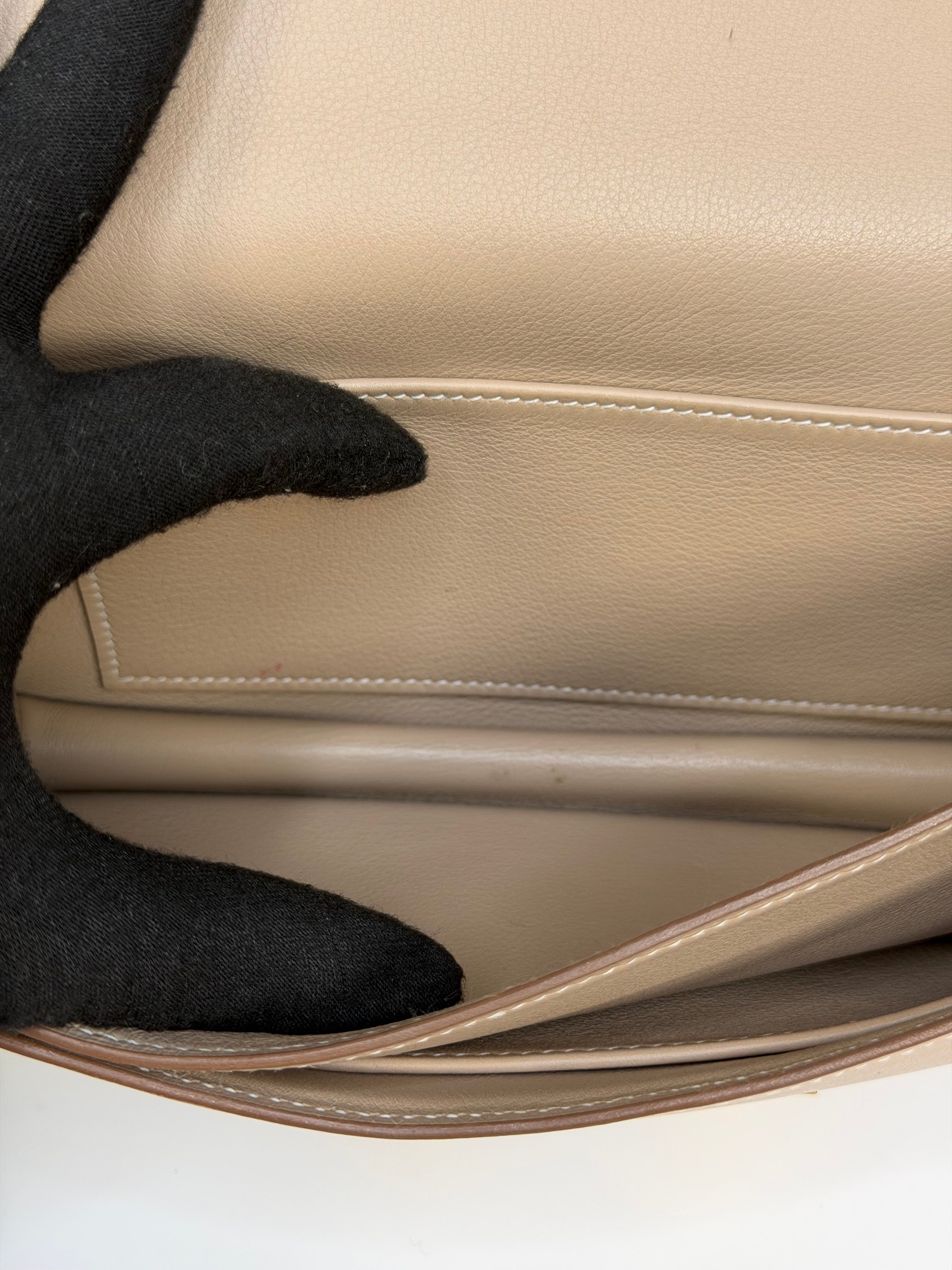 Hermès Constance Elan In Trench Swift Leather With Gold Hardware. Authentic and preloved in very good condition