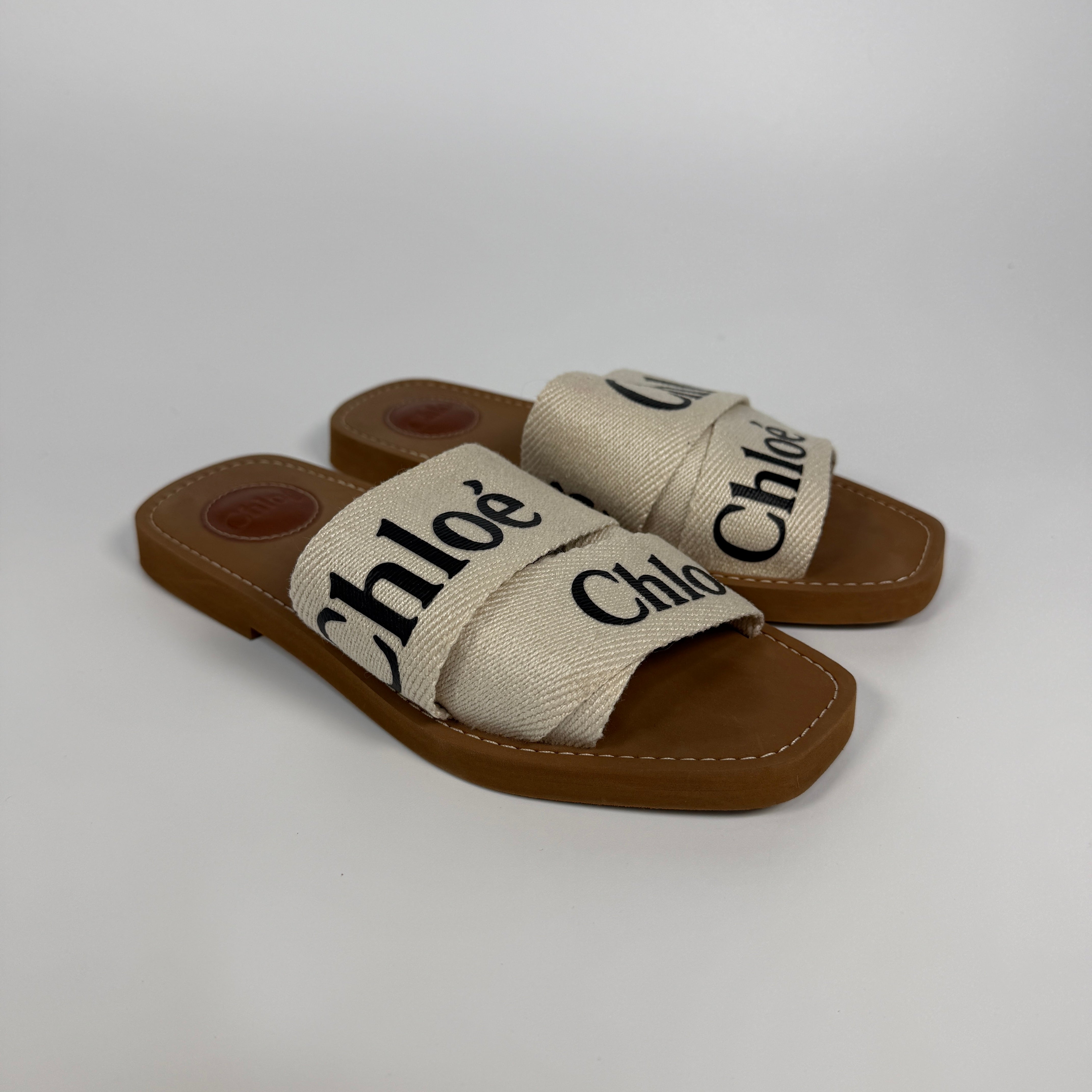 Authentic and preloved Chloe Woody Flat Mule  (Size 37/UK4) Very Good Condition. 100% Authenticity Guarantee 