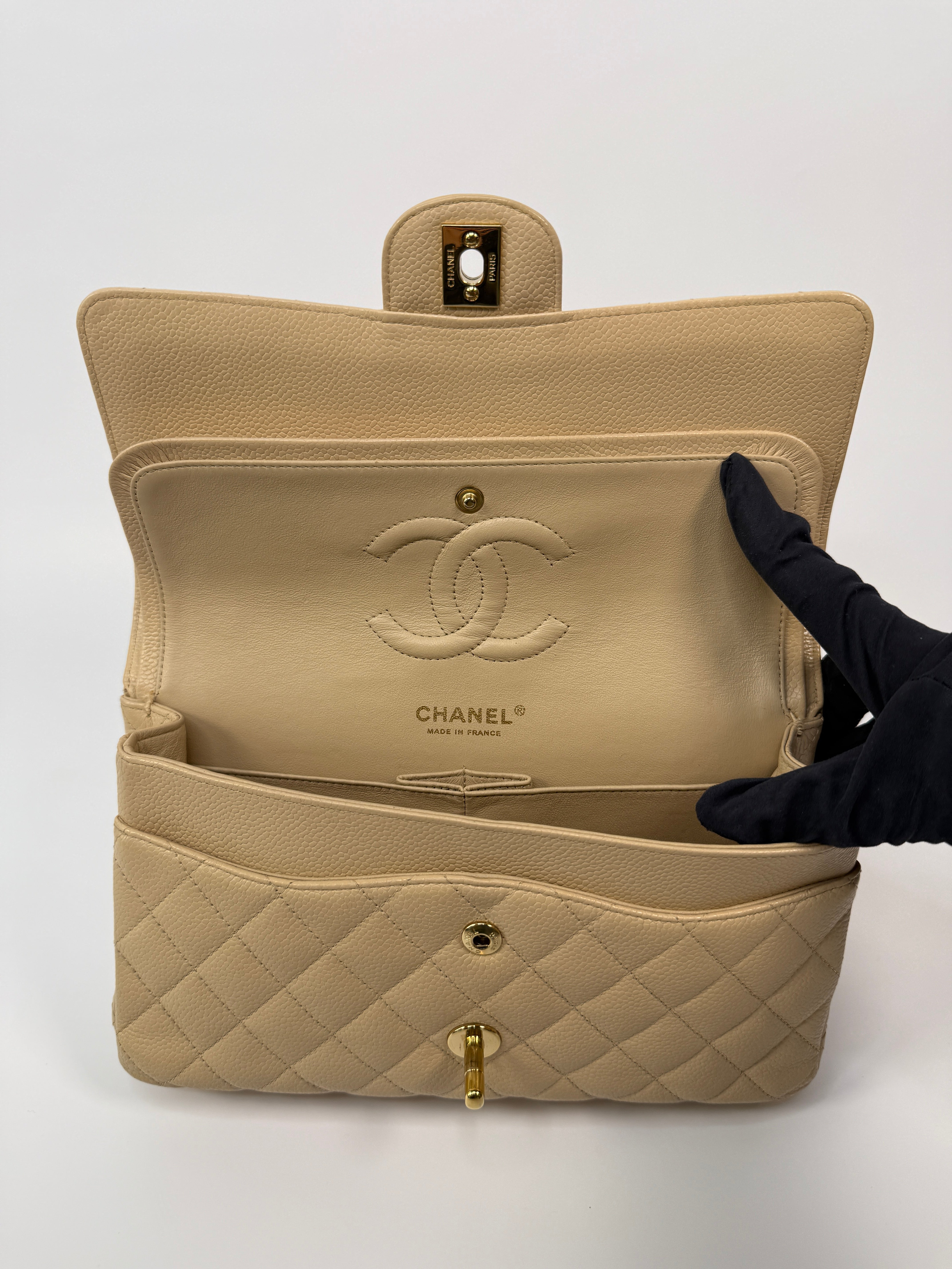 Chanel Medium Classic Double Flap Beige Caviar Leather With Gold Hardware
Pre Loved & Authentic 