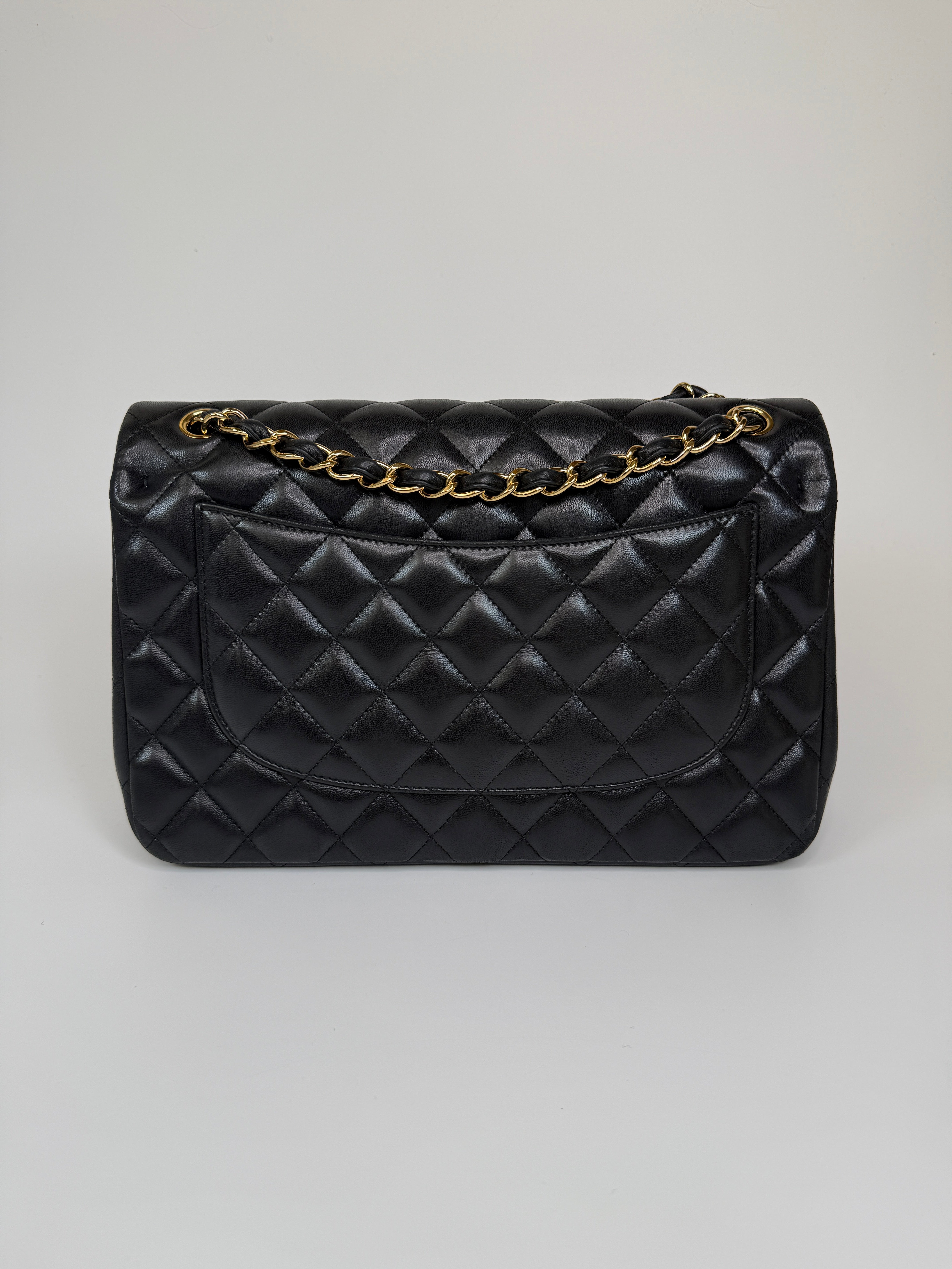 Authentic and preloved Chanel Jumbo Classic Flap Bag In Black Lambskin Leather With GOLD Hardware. Excellent condition. 100% Authenticity Guarantee 