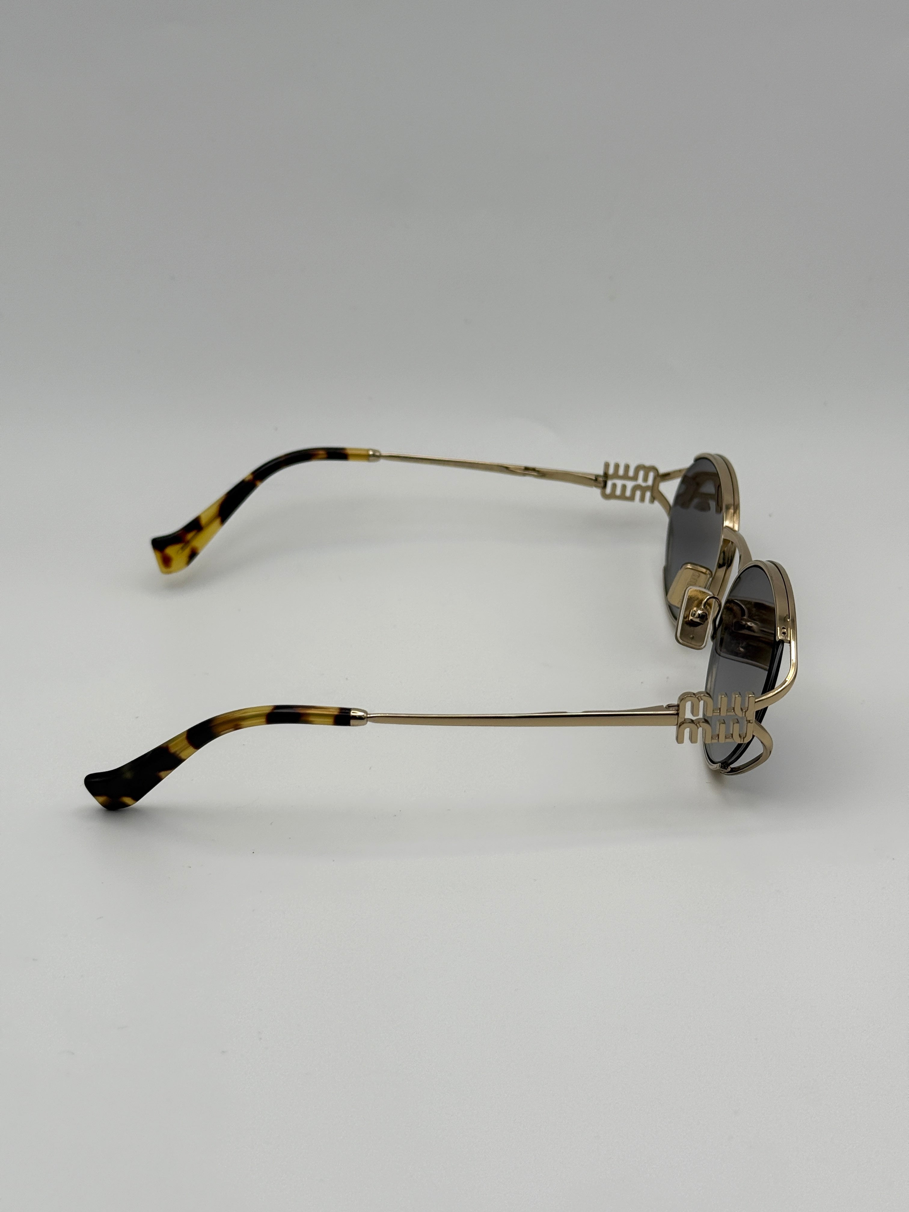 MiuMiu Sunglasses