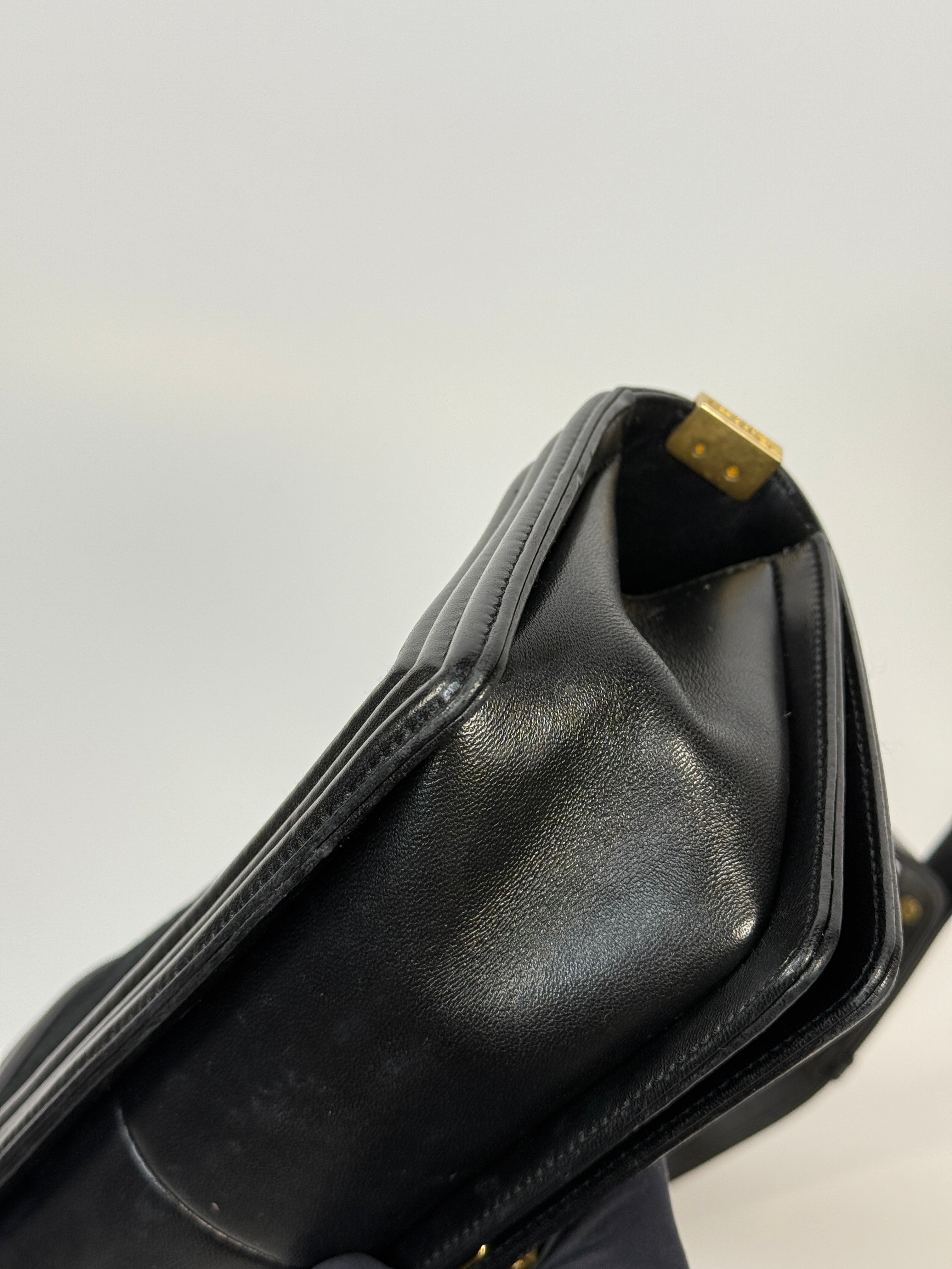 Chanel Black Chevron Fabric & Lambskin Leather Medium Boy Bag With Gold Hardware. Very Good Condition. Authentic and preloved. 