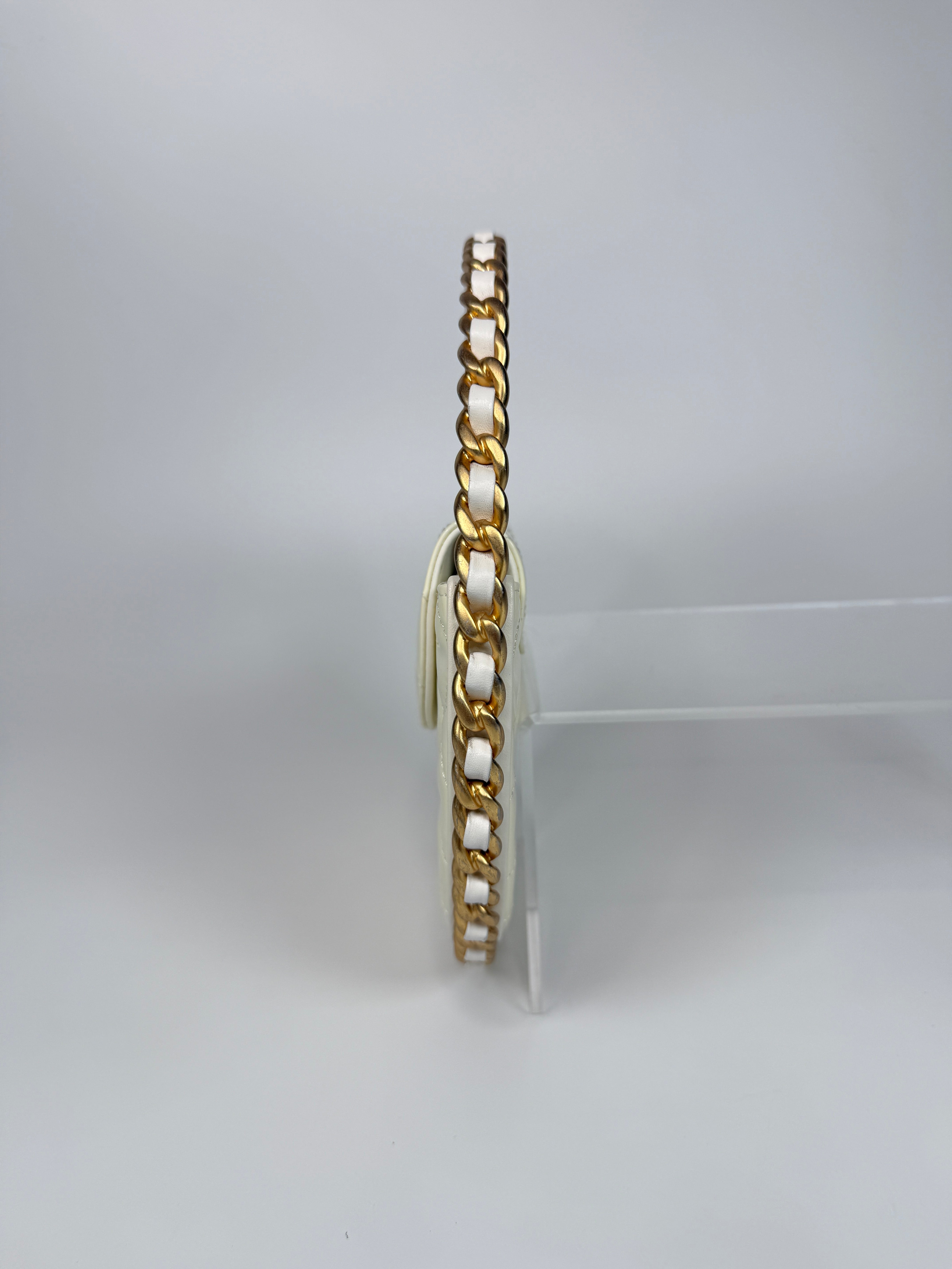 Authentic and preloved Chanel White Quilted Patent Leather Chain Around Hoop Bag In Excellent condition. 100% Authenticity Guarantee 