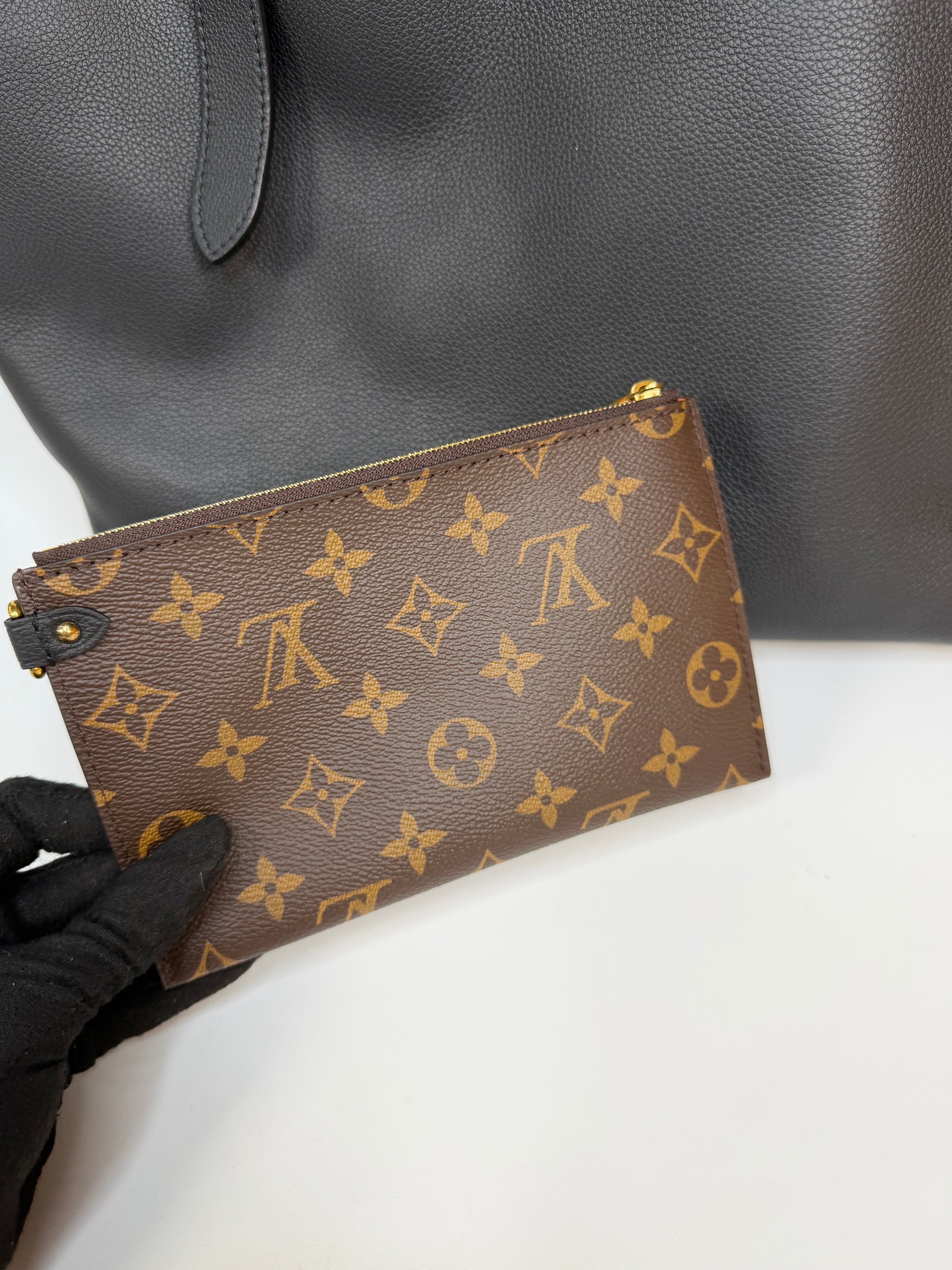 Louis Vuitton Low Key Cabas MM In Black Calfskin With Gold Hardware. Authentic and preloved in excellent condition