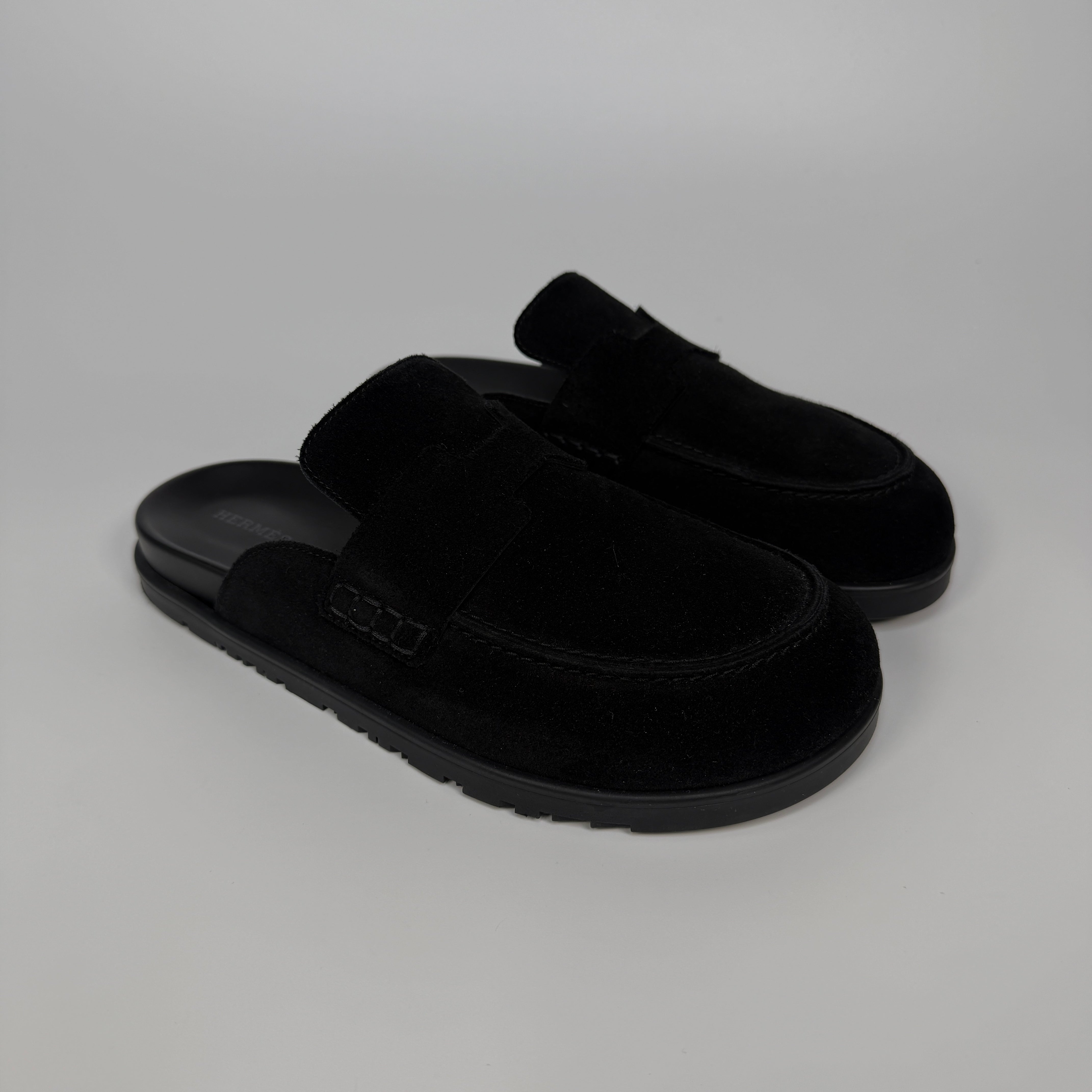 Authentic and preloved Hermès Go Mules In Black  (EU38/ UK5) Excellent condition. Verified by Luxe Cheshire