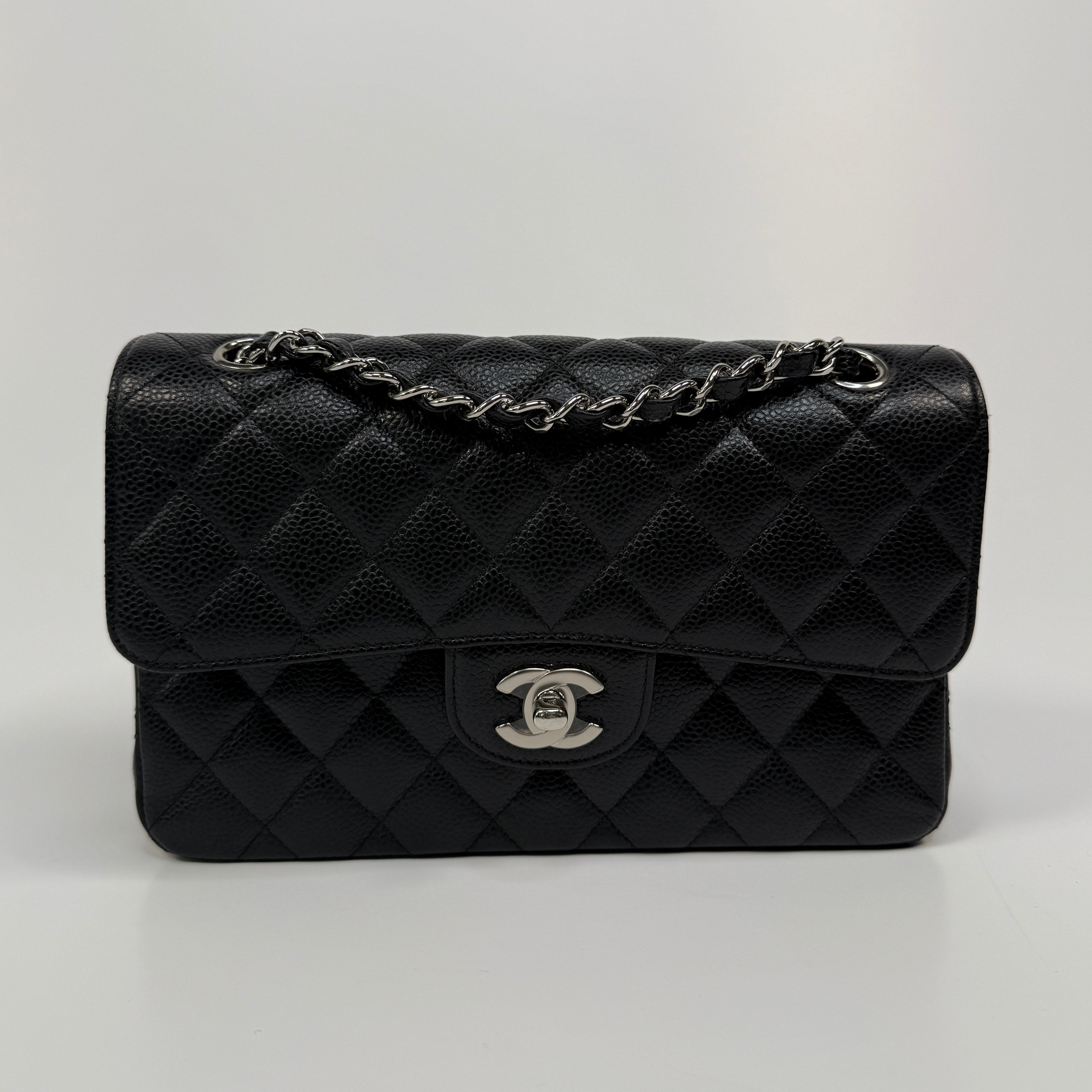 Chanel Small Classic Double Flap In Black Caviar Leather With Silver Hardware
Pre Loved & Authentic 