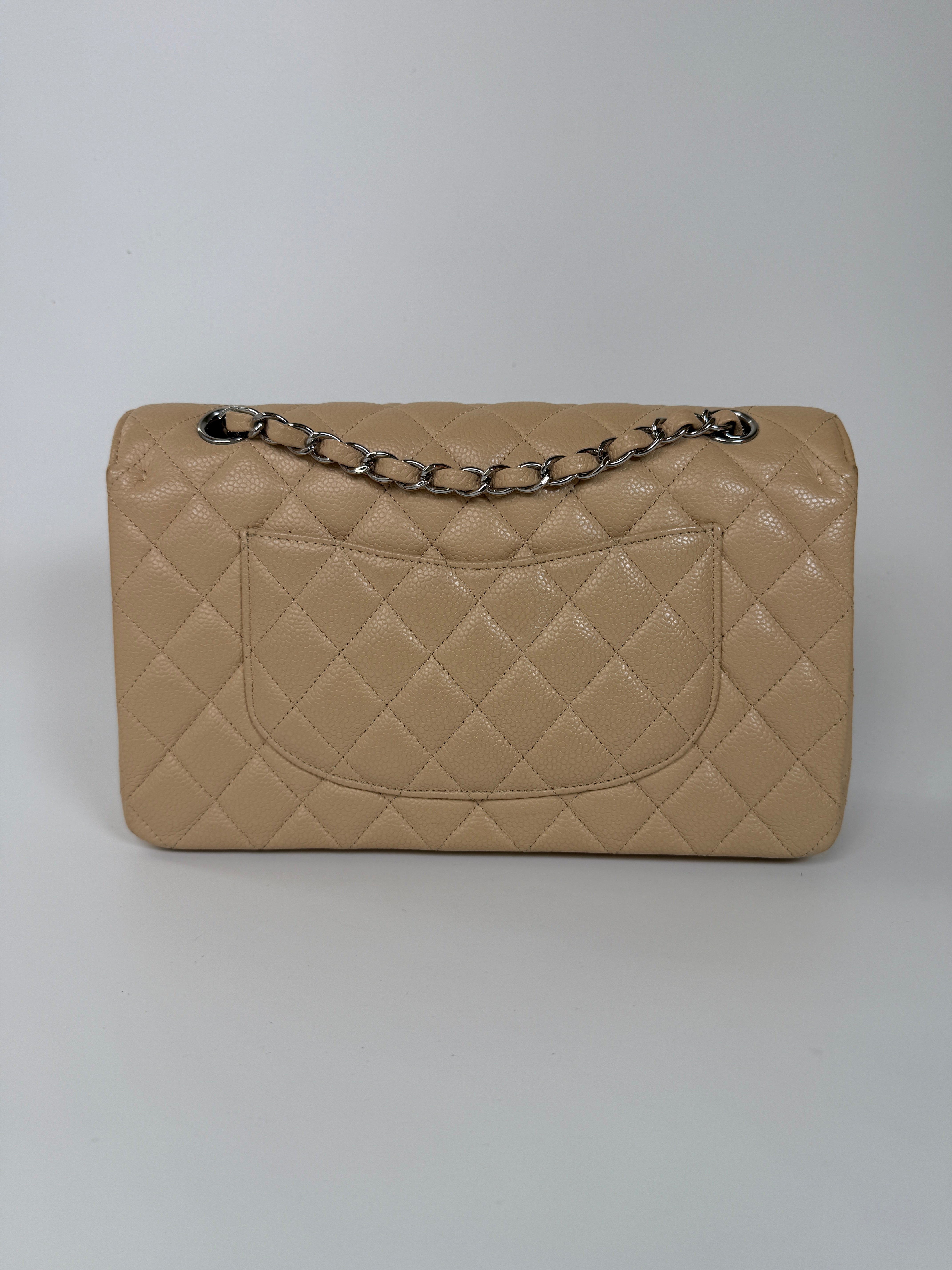 Chanel Medium Classic Double Flap Light Beige Caviar With Silver Hardware
Excellent condition, verified by Luxe Cheshire. International, fast  and fully insured delivery. Trusted designer resale.