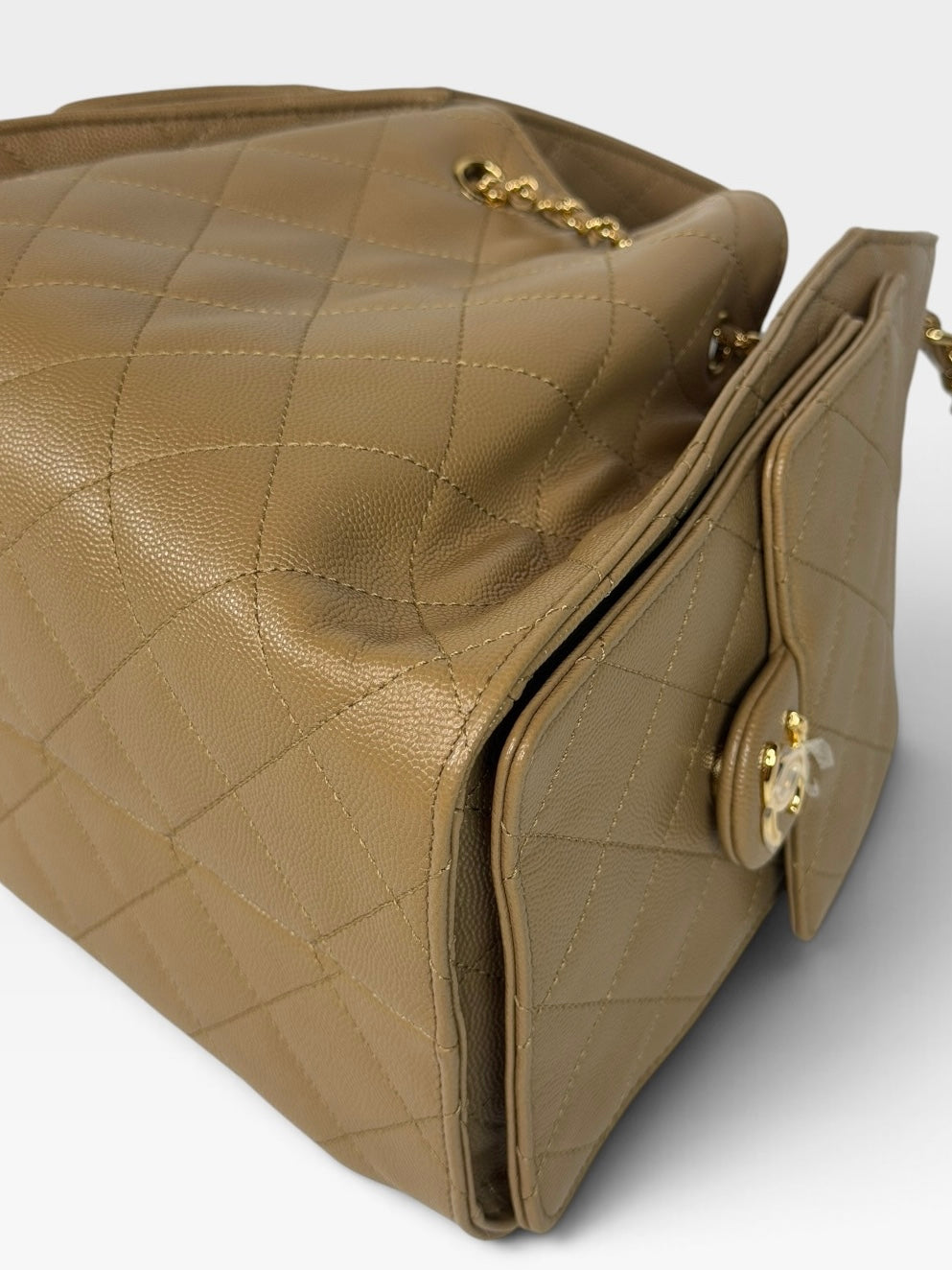 Chanel 25 Small In Brown Caviar Leather With Gold Hardware. 100% authentic and preloved in new and unused condition