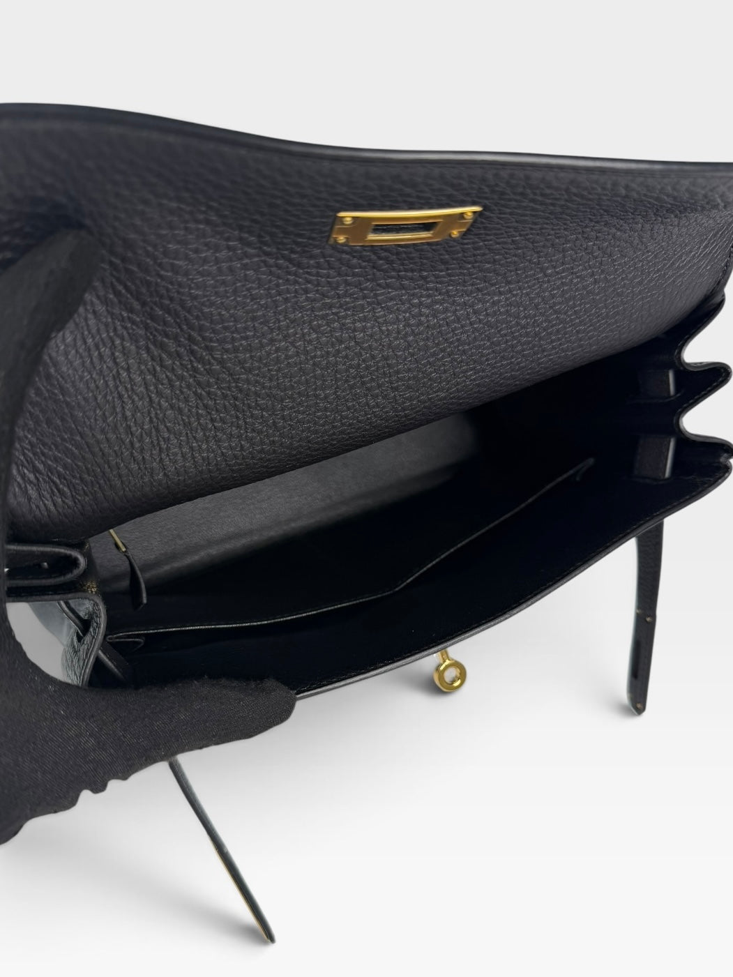 Authentic pre-loved Hermès Kelly 28 In Black Togo Leather Gold Hardware. New and Unused condition, verified by Luxe Cheshire. Trusted designer resale.