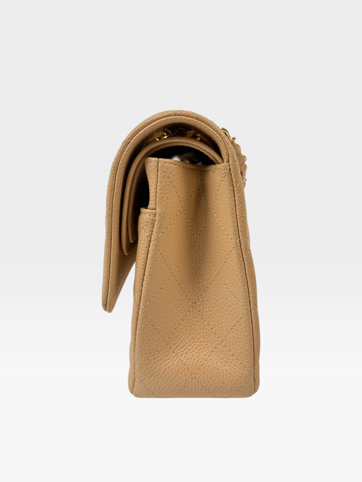 Chanel Medium Classic Flap In Beige Caviar Leather With Gold Hardware. 100% authentic and preloved in excellent condition