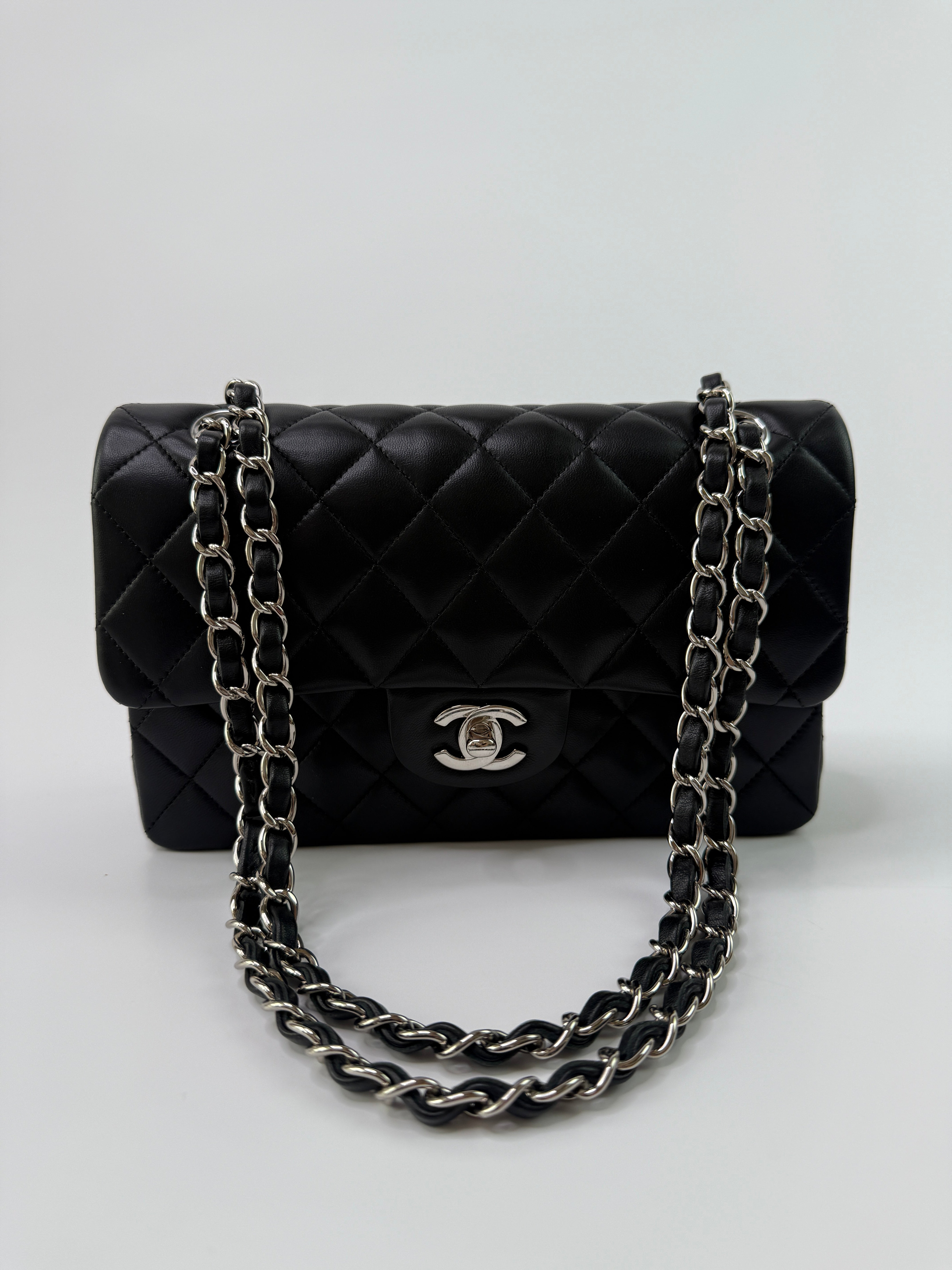 Chanel Small Classic Double Flap In Black Lambskin Leather With Silver Hardware
Pre Loved & Authentic 