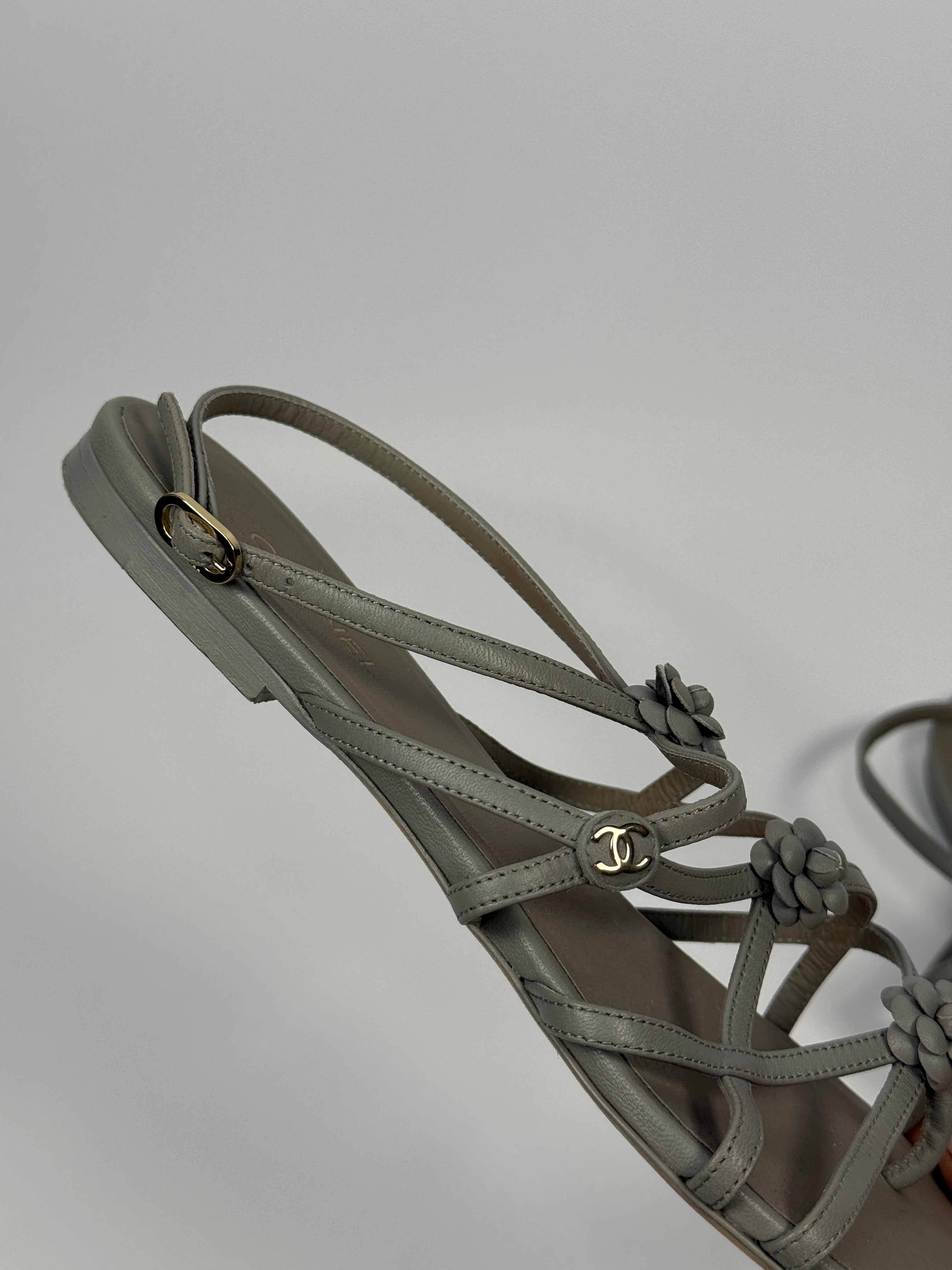 Chanel Camellia Sandals In Grey Leather Size 39.5/UK6.5. Authentic And Preloved In Very Good Condition.