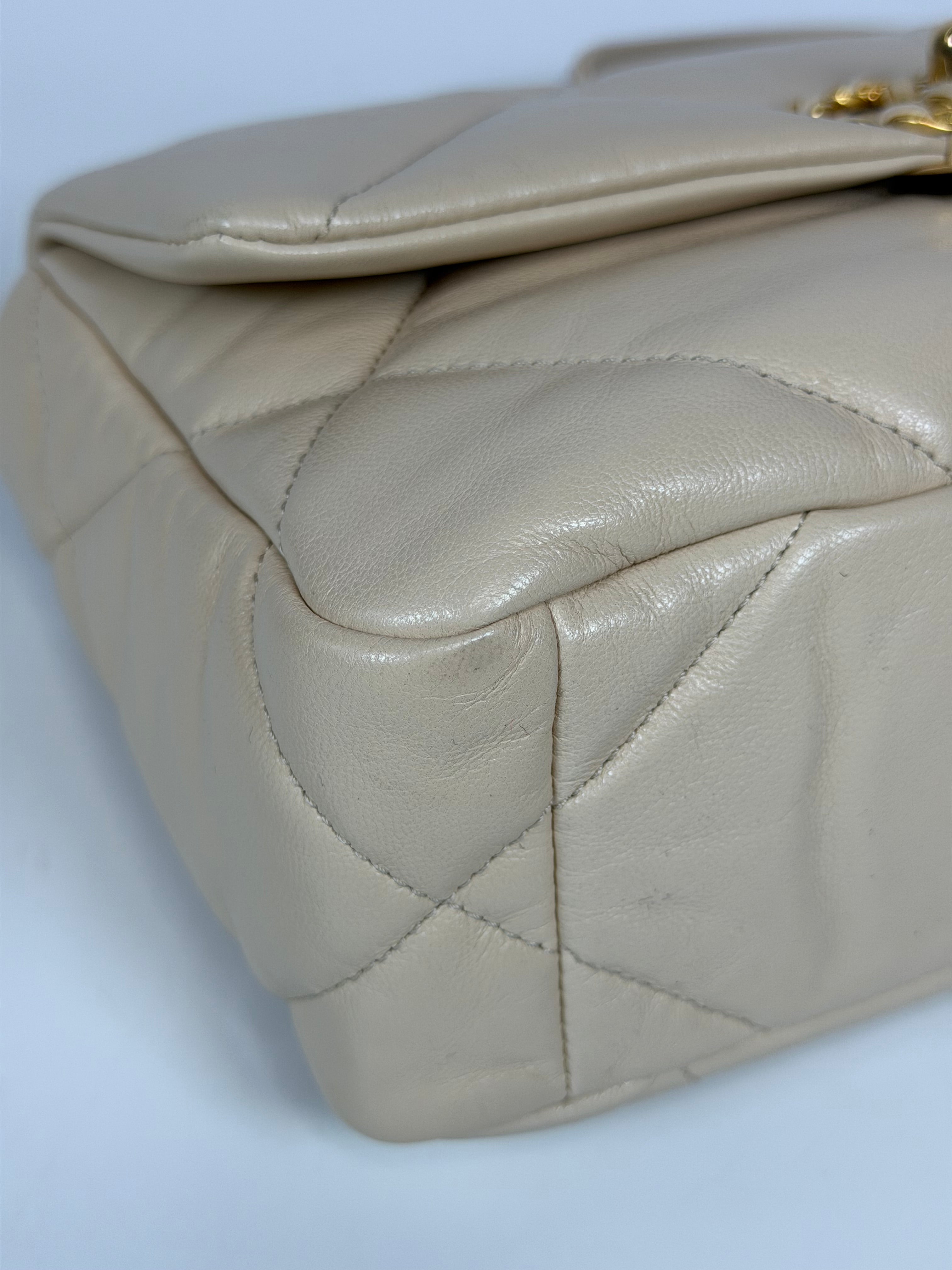 Chanel 19 Small In Beige Leather With Mixed Hardware. Authentic and preloved in excellent condition. Verified by Luxe Cheshire.