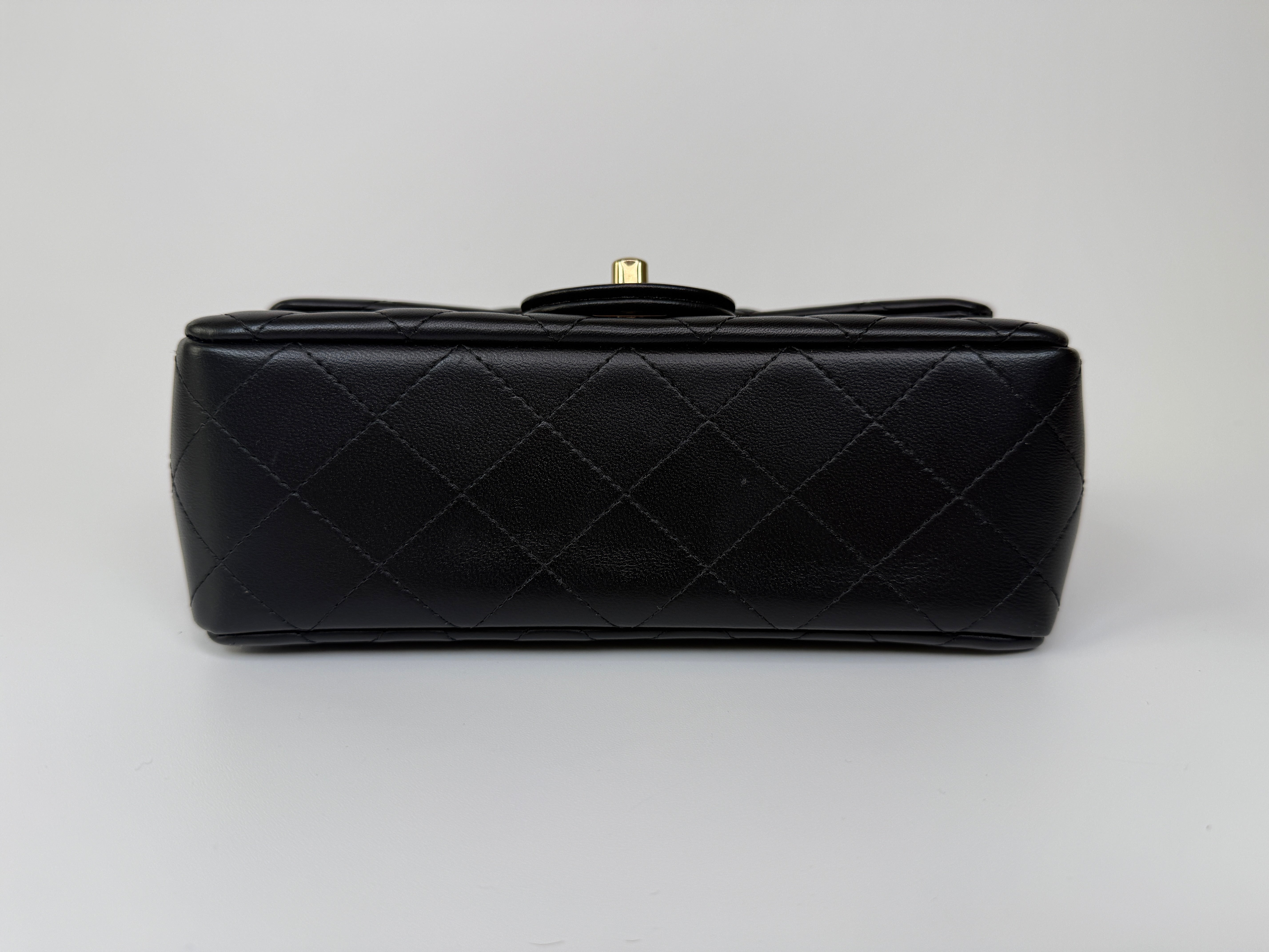 Authentic and preloved Chanel Mini Rectangle Flap Bag In Black Lambskin Leather With Pale Gold Hardware. Excellent condition. 100% Authenticity guarantee 