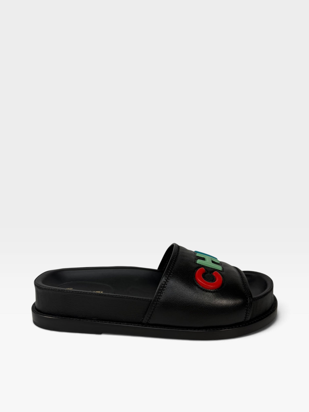 Chanel Multicolour Logo Slide Sandals In Black Leather. 100% authentic and preloved in excellent condition