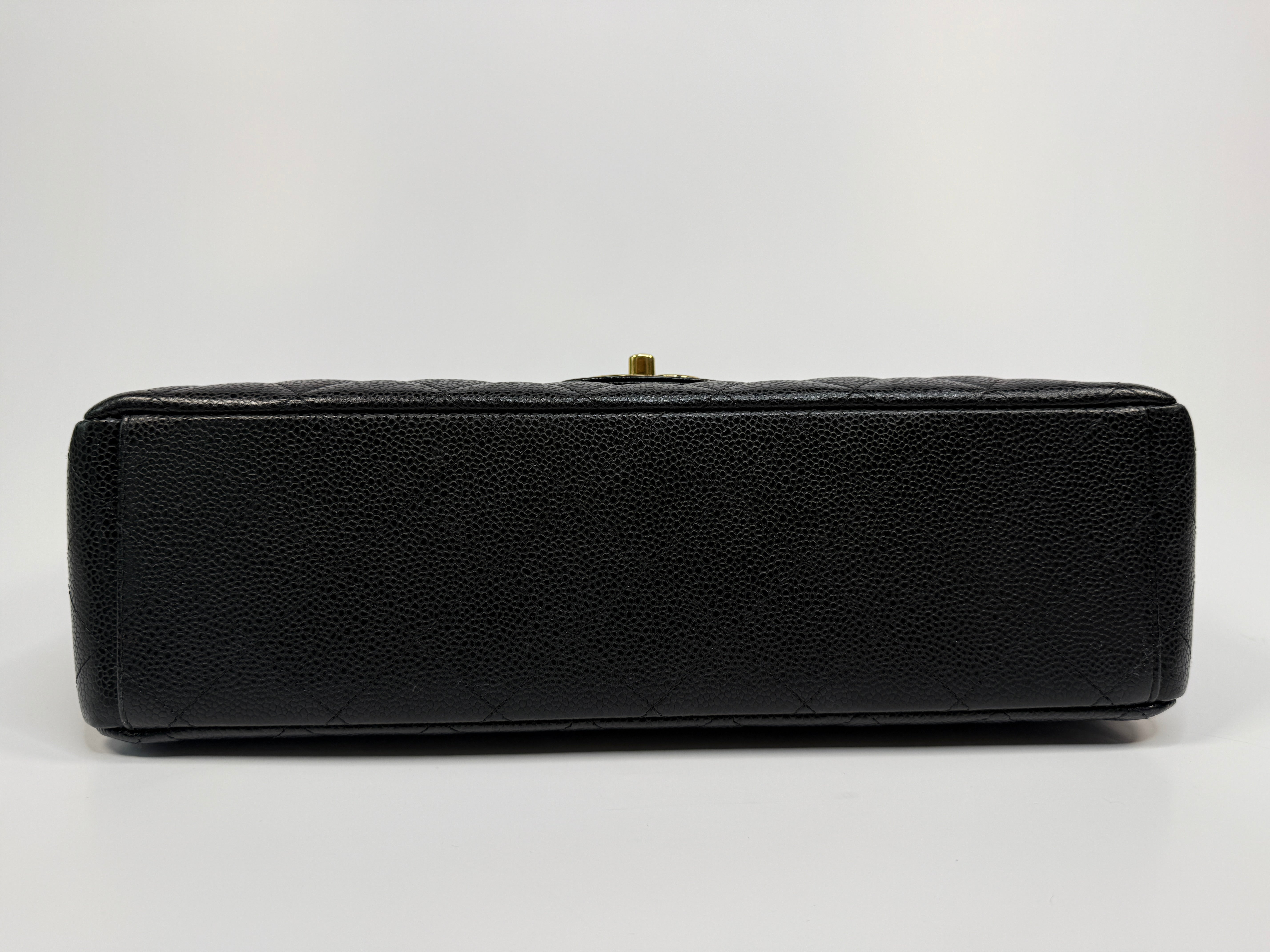 Chanel Maxi Classic Double Flap In Black Caviar Leather With Gold Hardware
Pre Loved & Authentic 