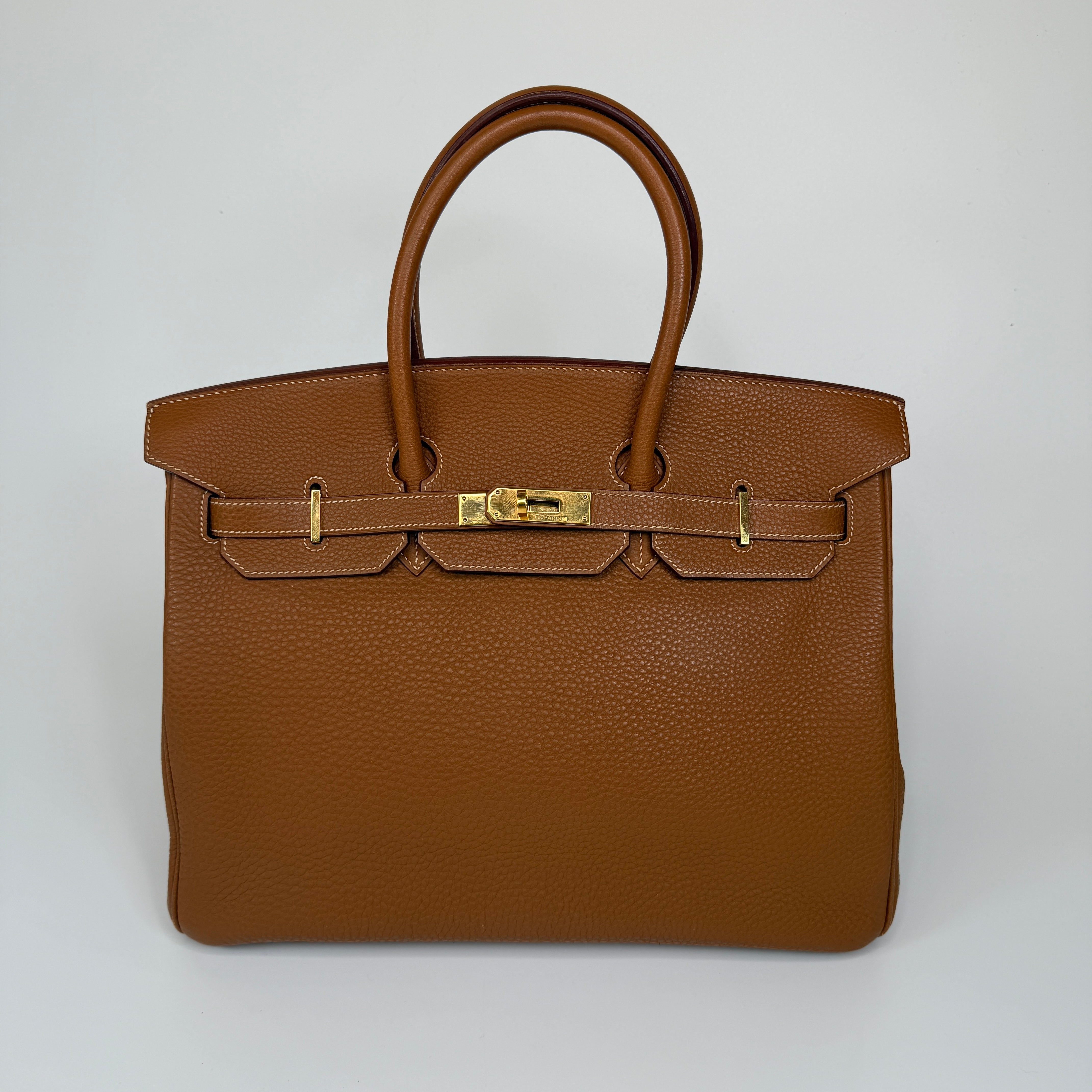 Authentic and preloved Hermès Birkin 35 In Gold Togo Leather With Gold Hardware. 100% Authenticity guarantee 