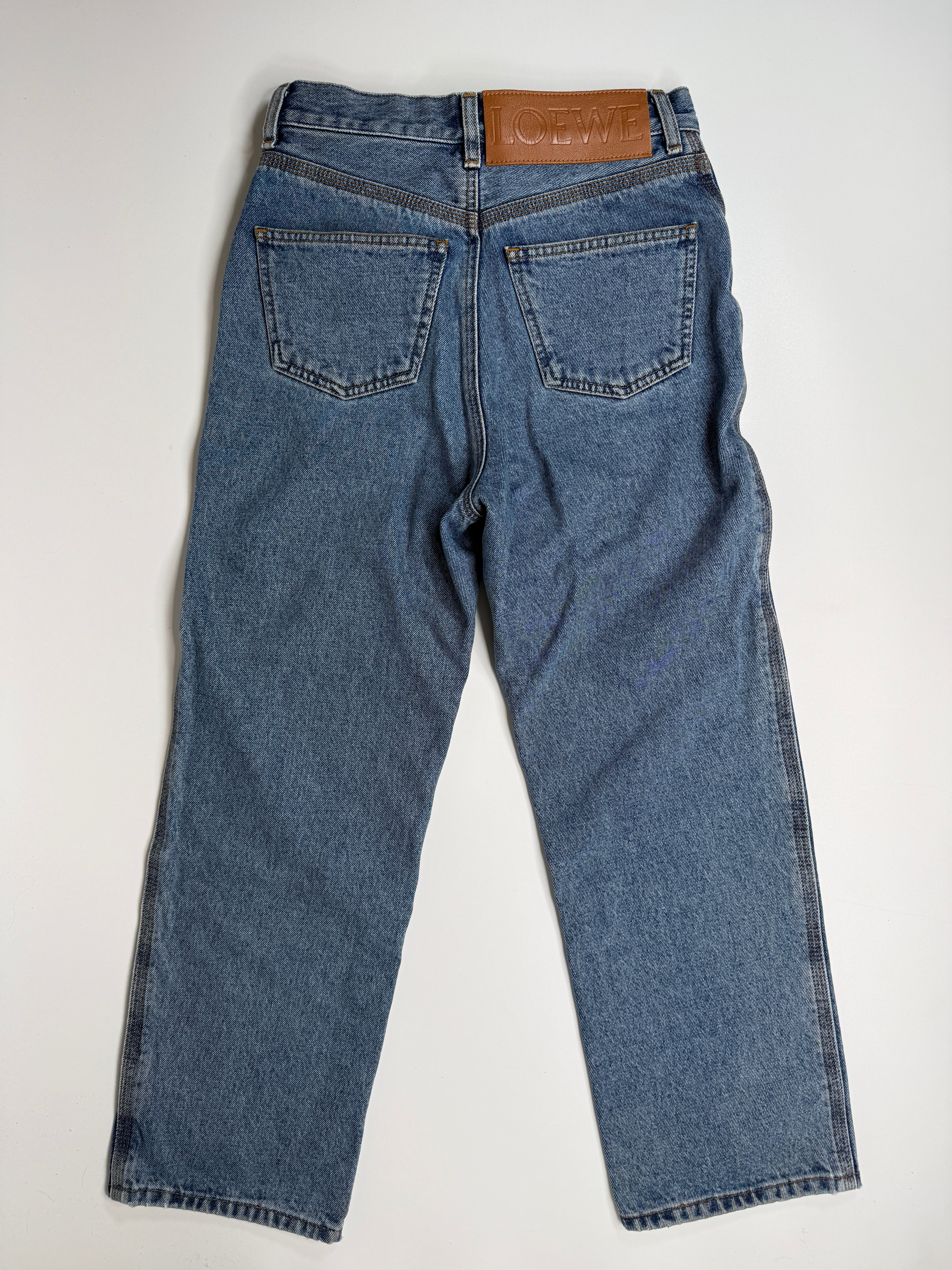 Authentic and preloved Loewe Anagram Denim Jeans  (Size 36/UK8) In Blue Denim. Excellent Condition. Fully Insured next day delivery. Verified by Luxe Cheshire. 
