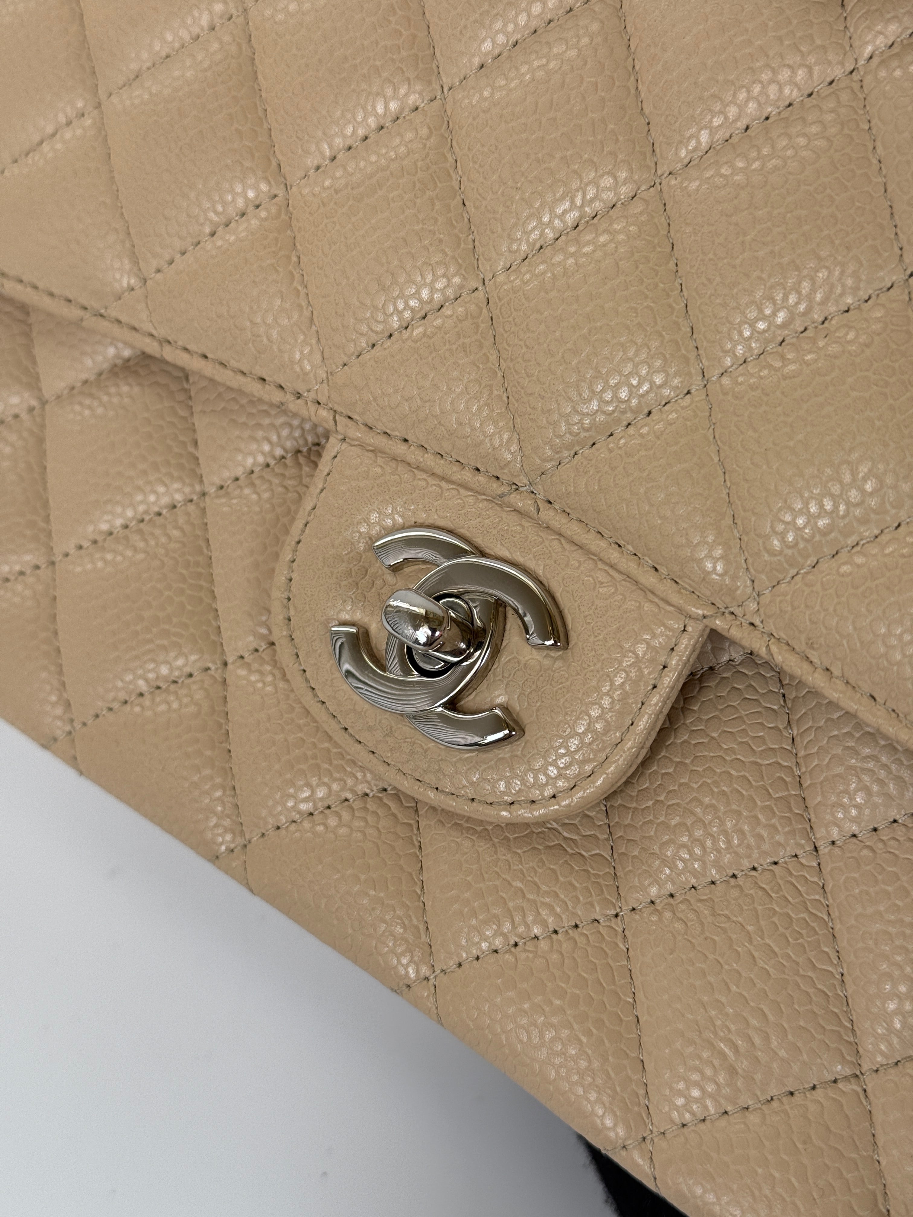 Chanel Medium Classic Double Flap Light Beige Caviar With Silver Hardware
Excellent condition, verified by Luxe Cheshire. International, fast  and fully insured delivery. Trusted designer resale.