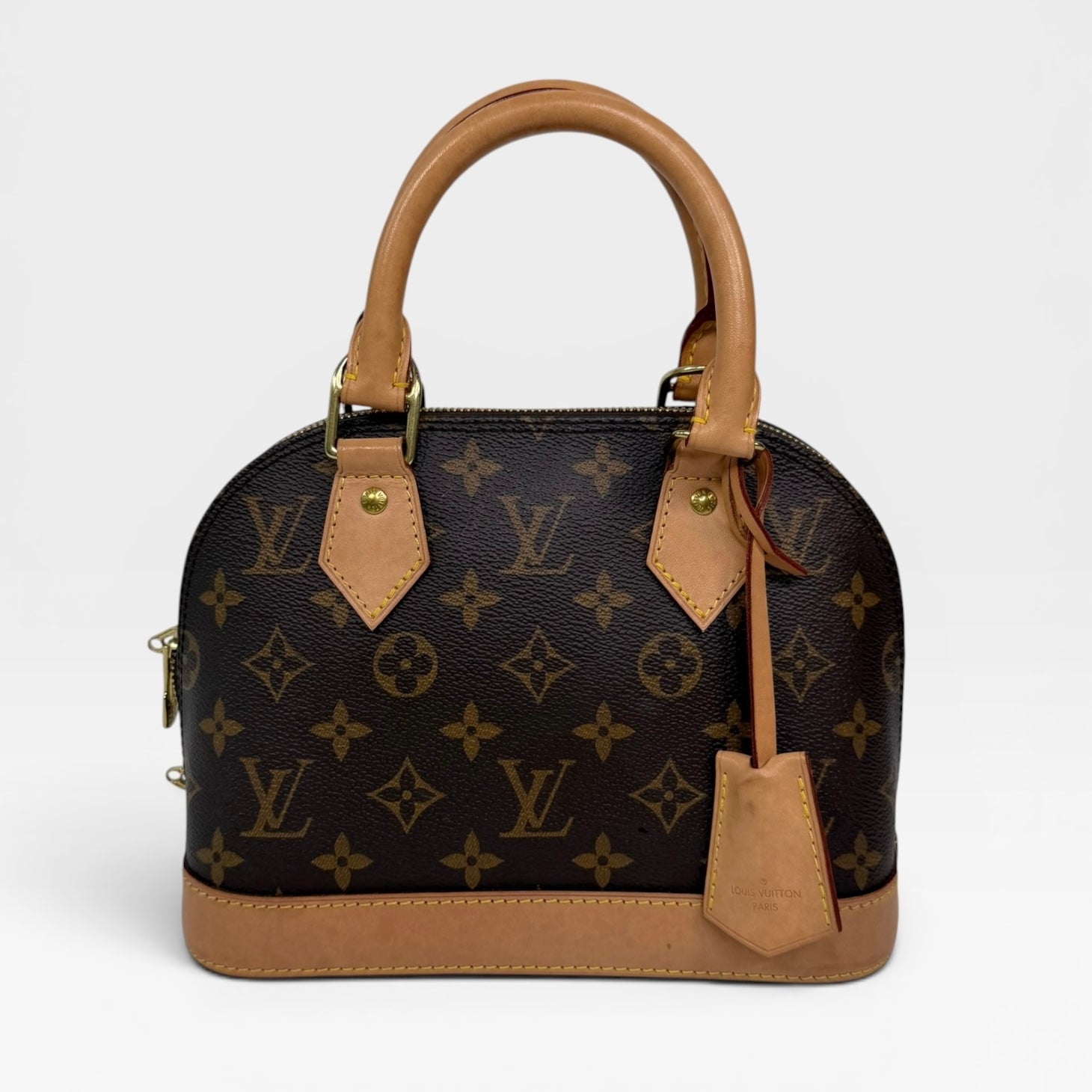 Louis Vuitton Alma BB In Brown Monogram Canvas With Gold Hardware. Authentic and preloved in very good condition