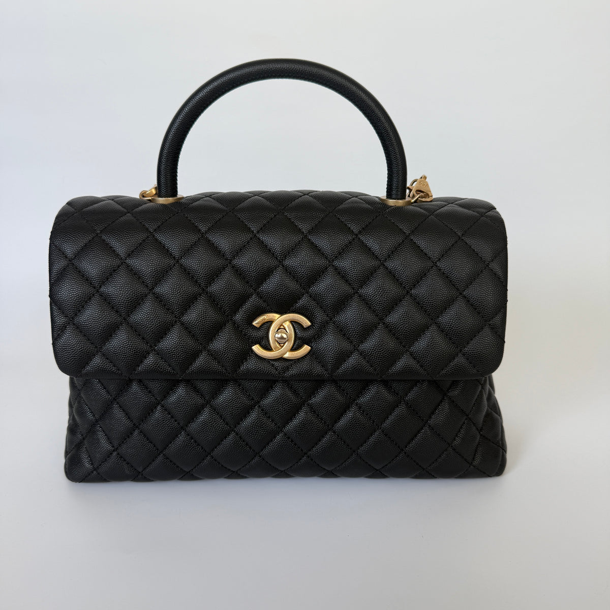 Chanel Coco Large Top Handle In Caviar Leather With Gold Hardware. Verified by Luxe Cheshire. Trusted designer resale.