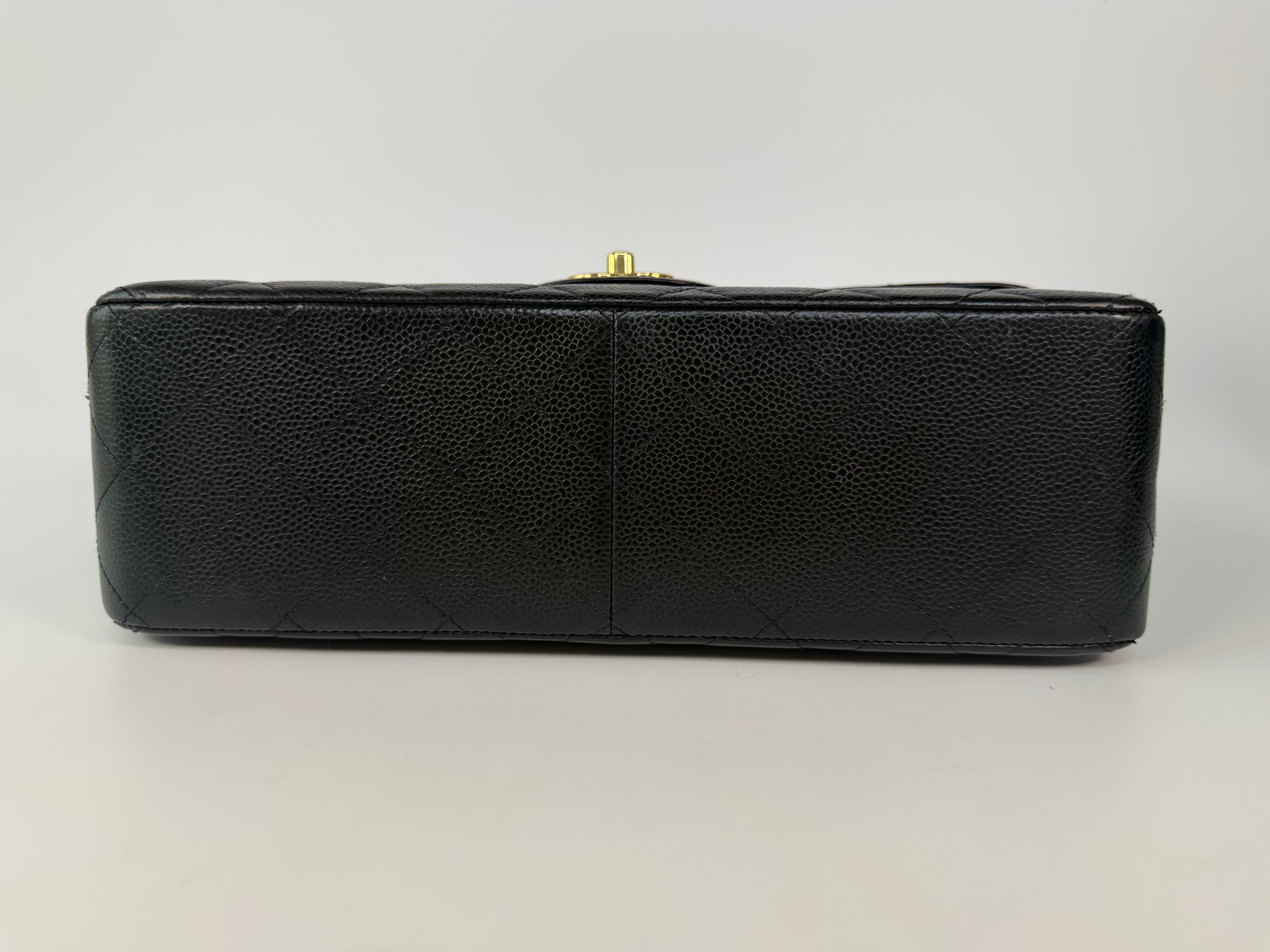 Chanel Jumbo Classic Flap Bag In Black Caviar Leather With Gold Hardware 100% authentic and preloved in excellent condition