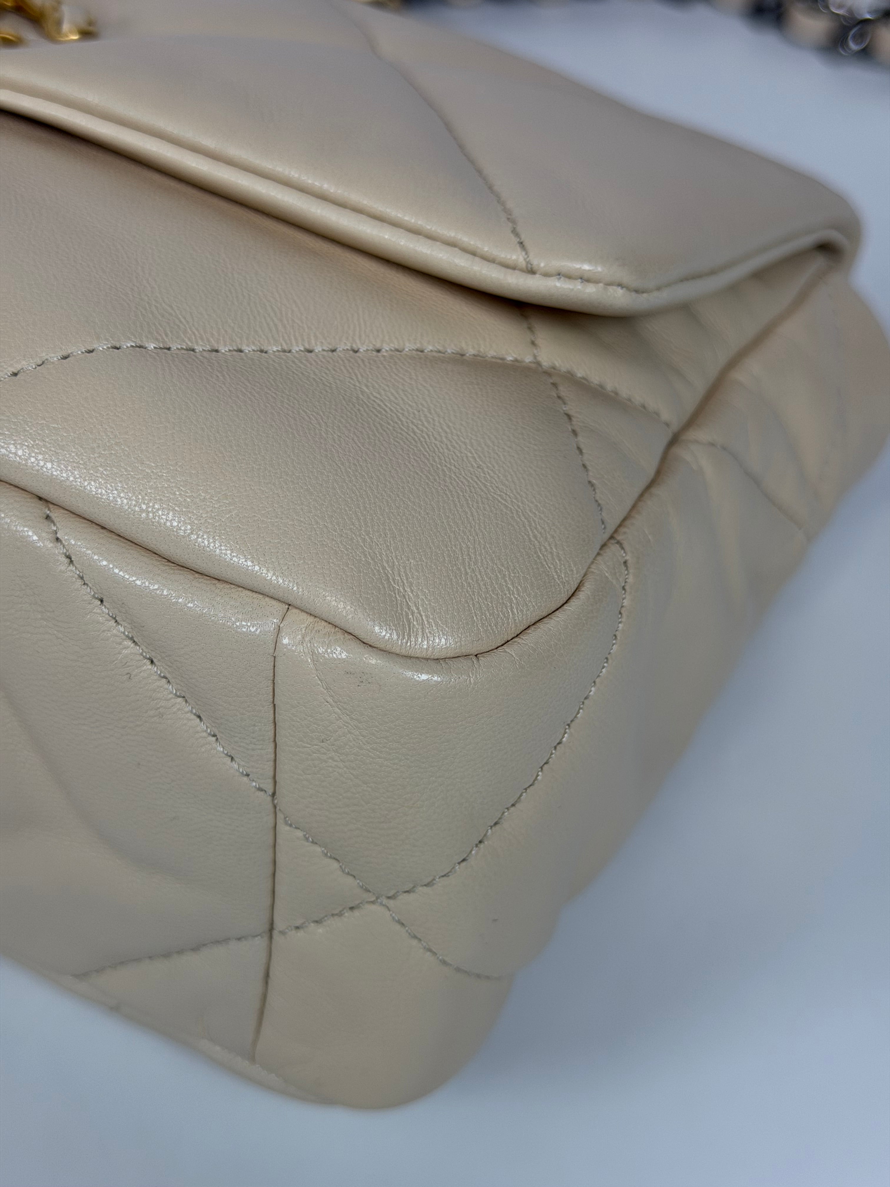 Chanel 19 Small In Beige Leather With Mixed Hardware. Authentic and preloved in excellent condition. Verified by Luxe Cheshire.