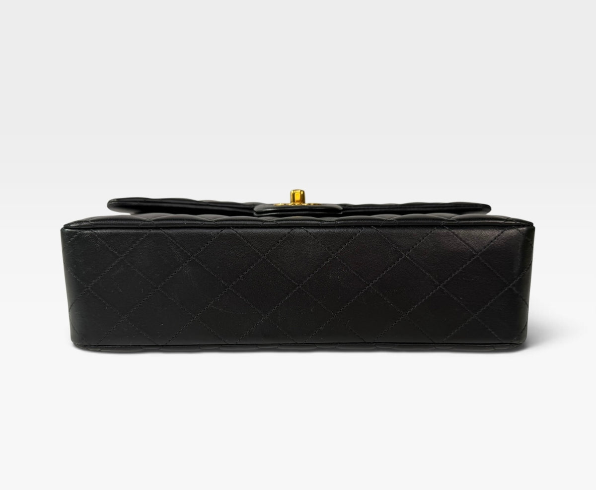 Chanel Medium Classic Double Flap In Black Lambskin Leather Gold Hardware. 100% authentic and preloved in excellent condition 