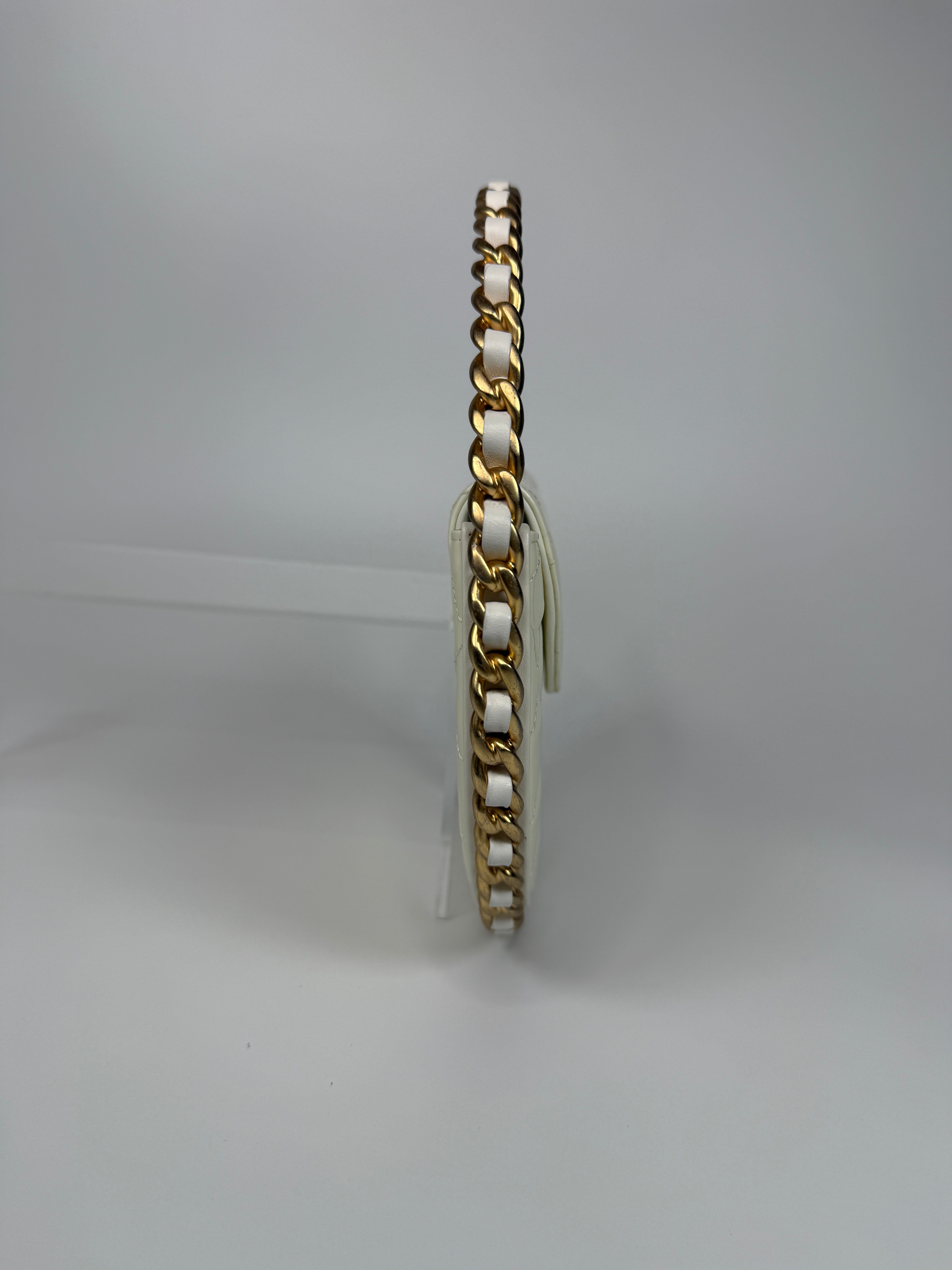 Authentic and preloved Chanel White Quilted Patent Leather Chain Around Hoop Bag In Excellent condition. 100% Authenticity Guarantee 